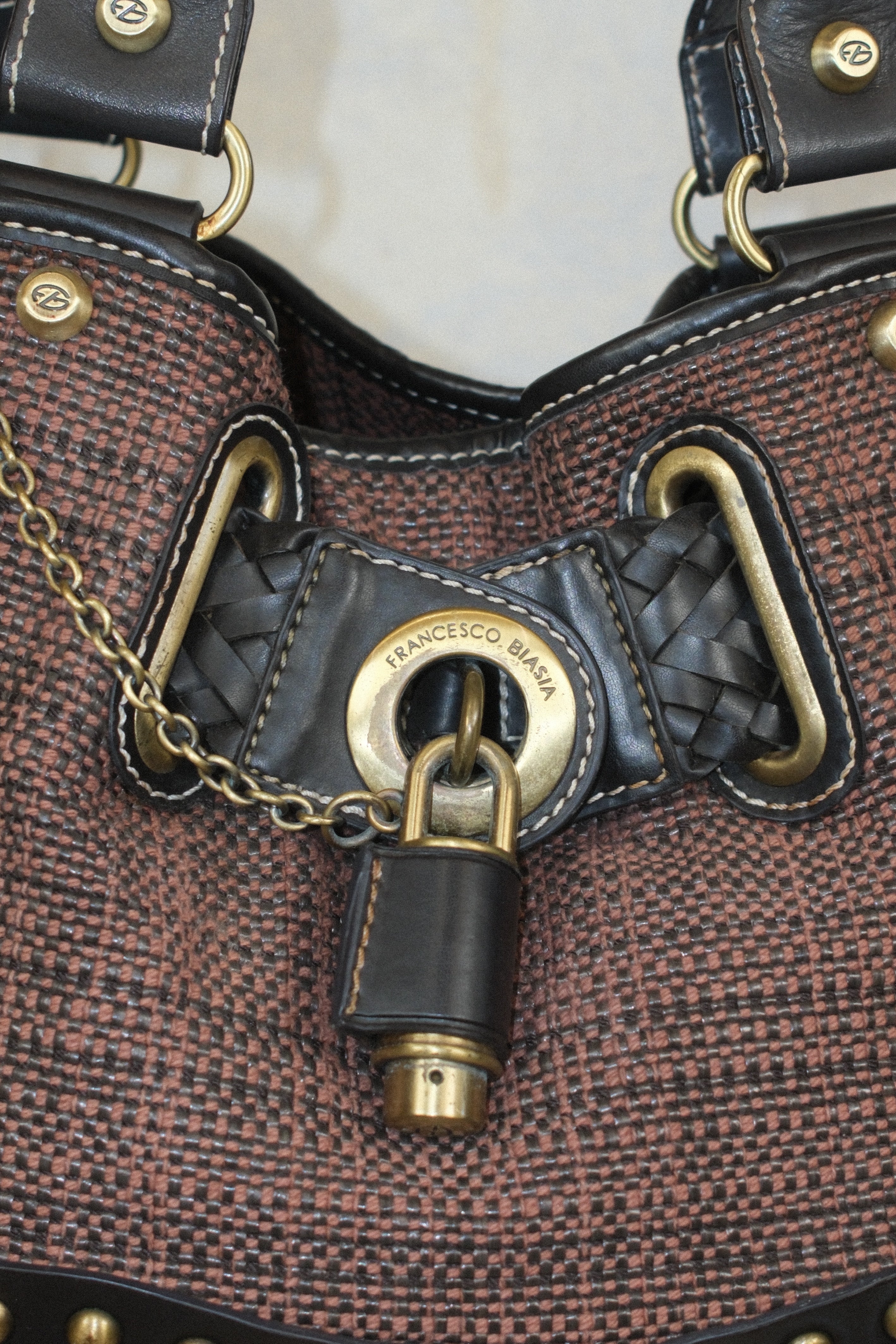 FRANCESCO BIASIA WOVEN BAG WITH CHARM CLOSURE IN CHOCOLATE BROWN & EARTH TONE