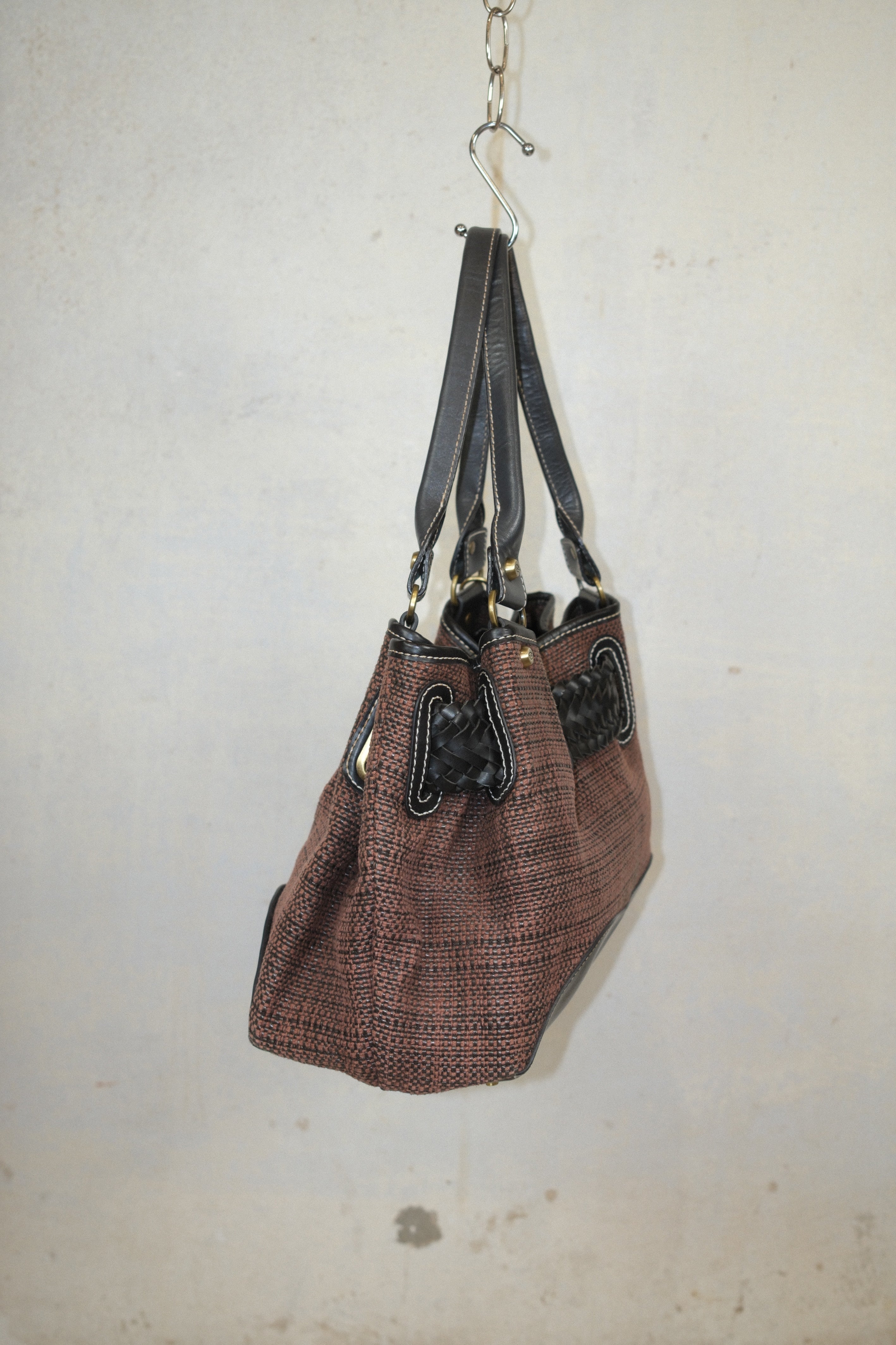 FRANCESCO BIASIA WOVEN BAG WITH CHARM CLOSURE IN CHOCOLATE BROWN & EARTH TONE