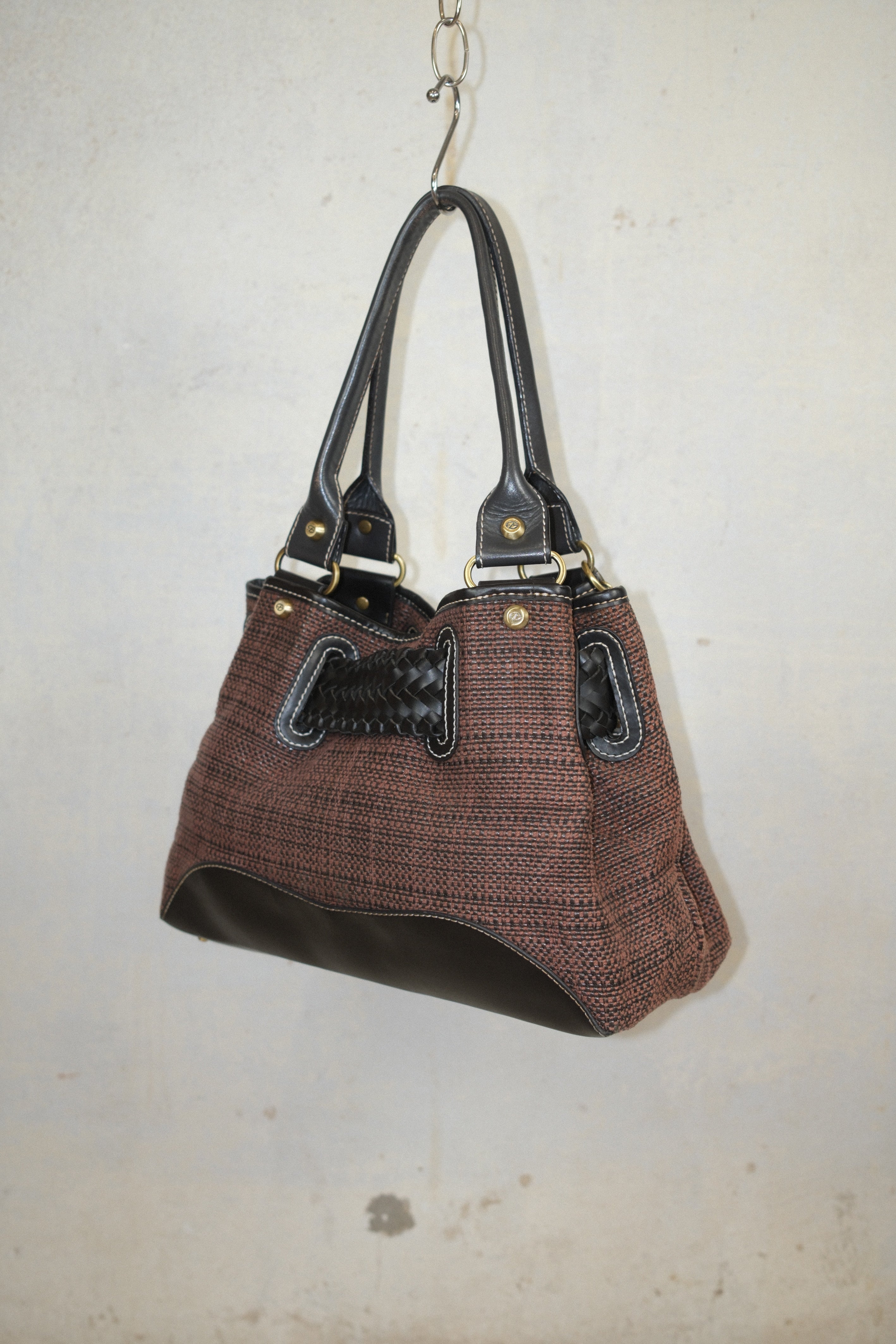 FRANCESCO BIASIA WOVEN BAG WITH CHARM CLOSURE IN CHOCOLATE BROWN & EARTH TONE