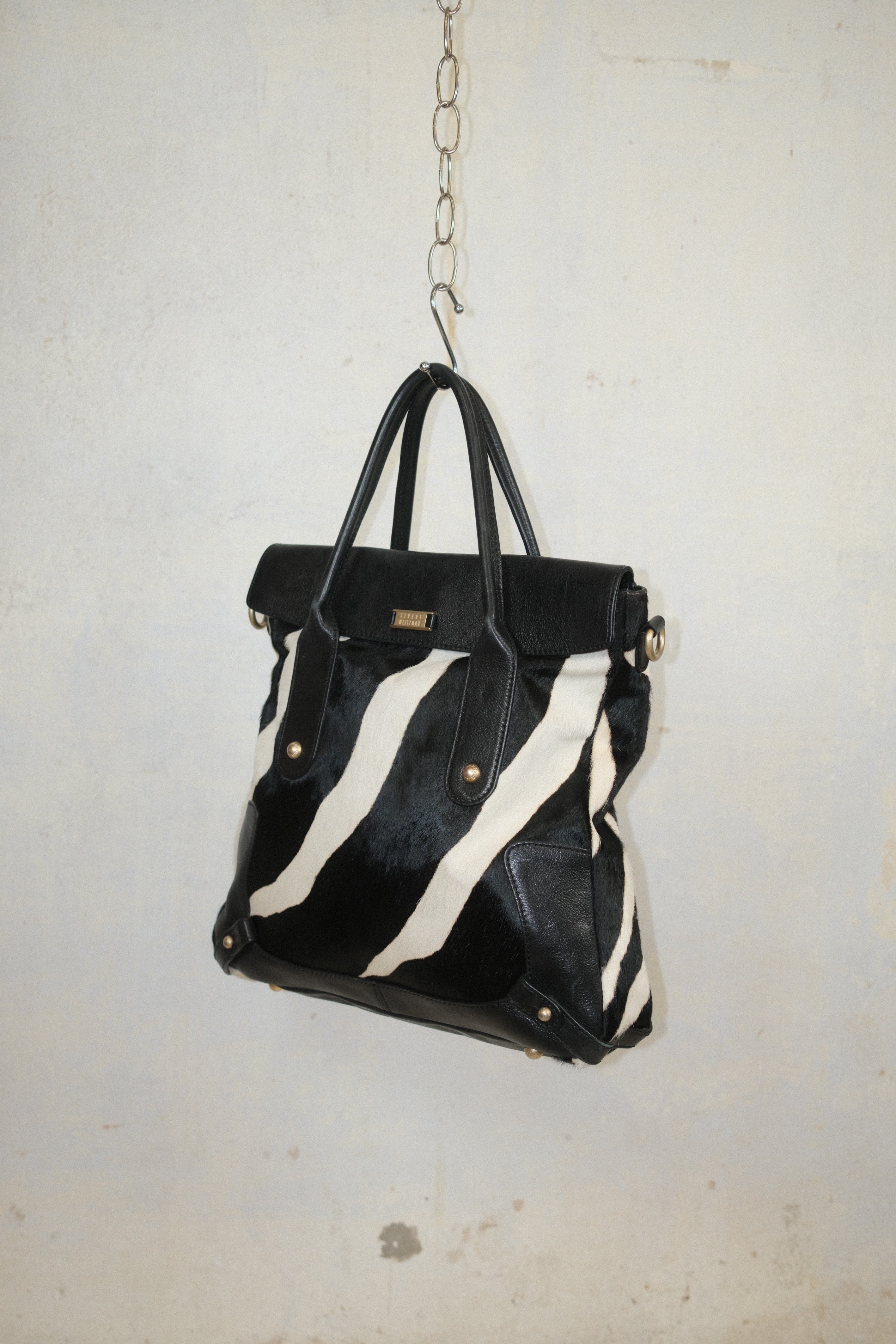 STEWART WEITZMAN ZEBRA PRINT HAIRY PONY LEATHER HANDBAG