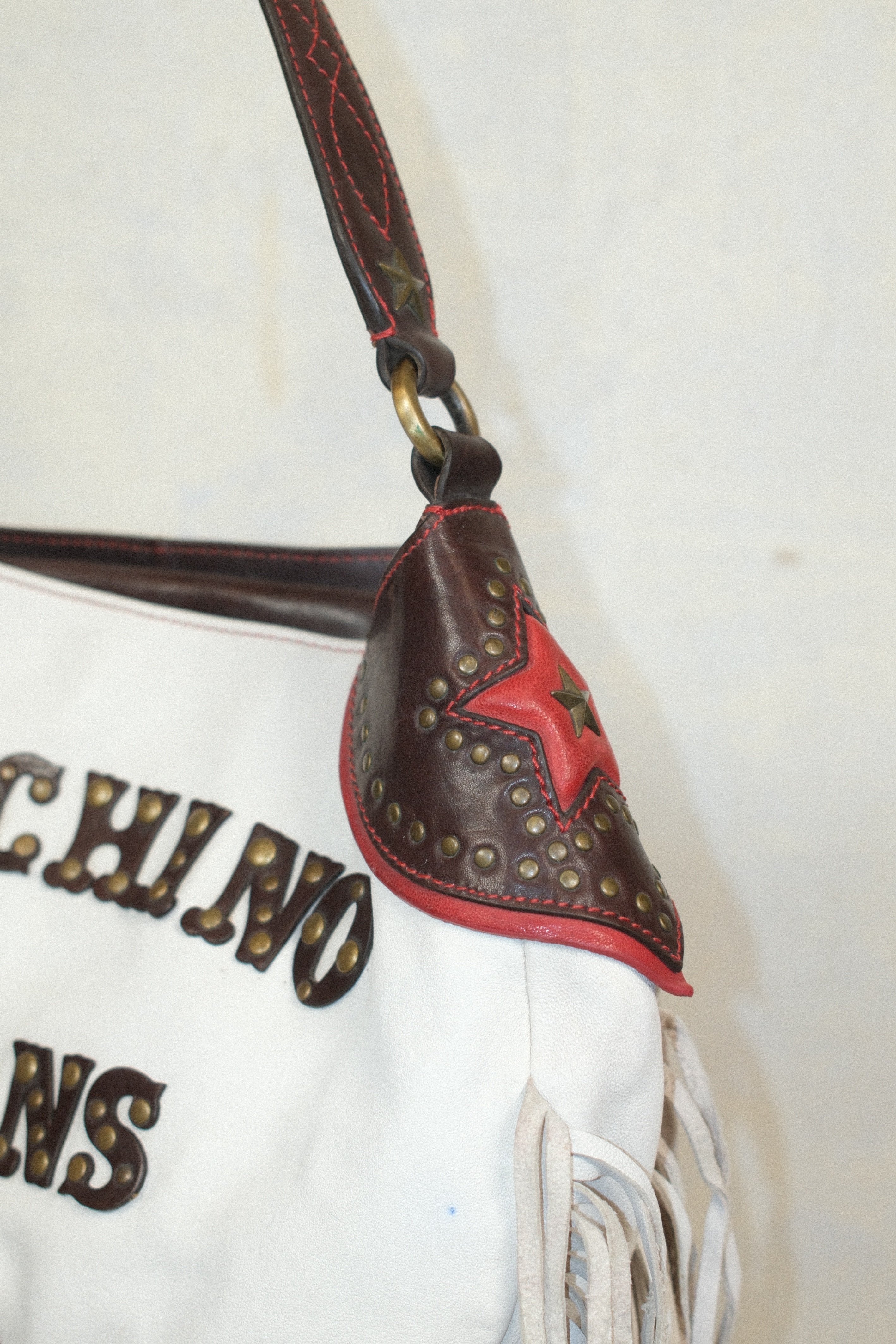 MOSCHINO WESTERN STYLE BAG IN WHITE LEATHER WITH FRINGE STUDS