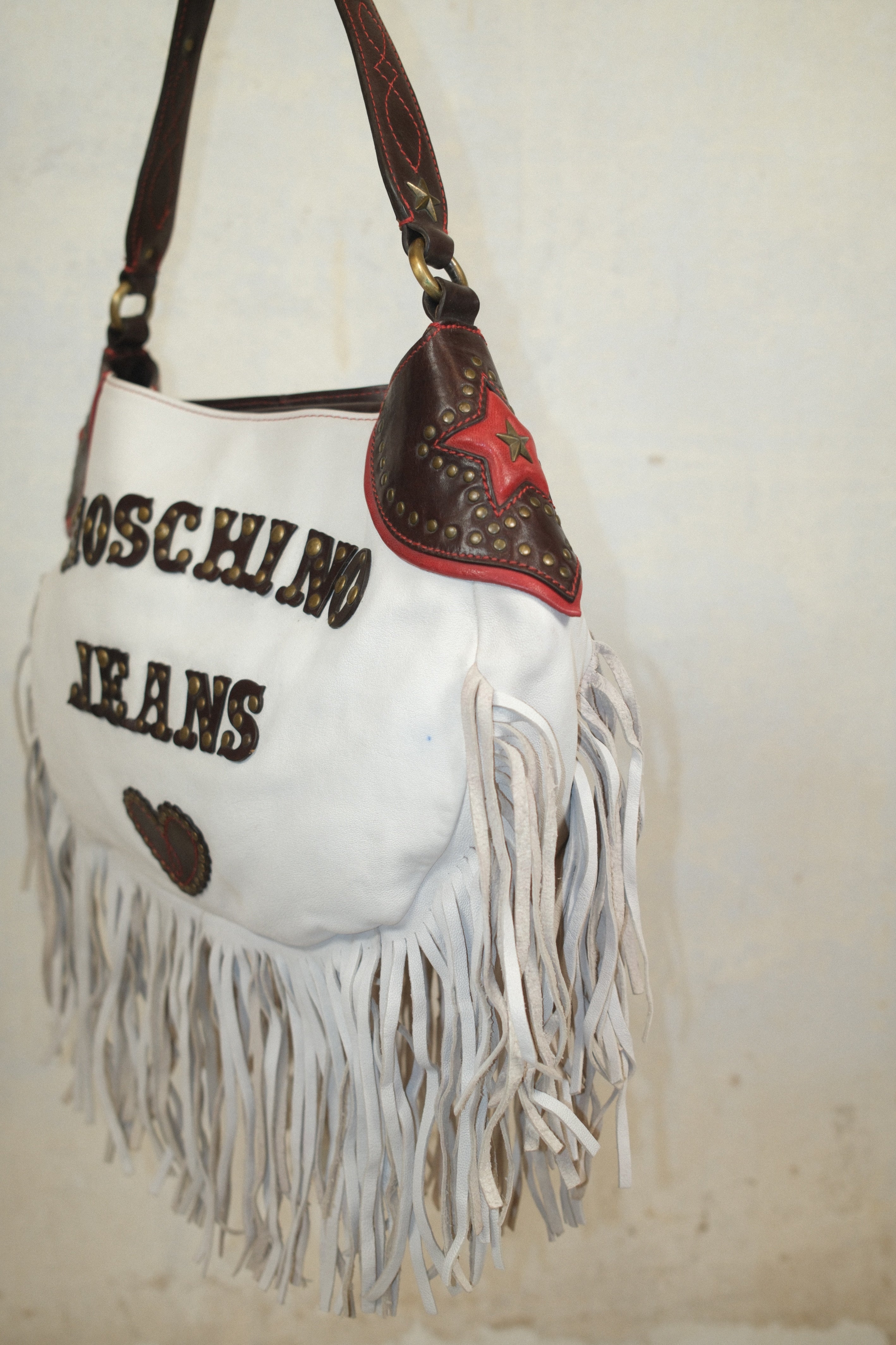 MOSCHINO WESTERN STYLE BAG IN WHITE LEATHER WITH FRINGE STUDS