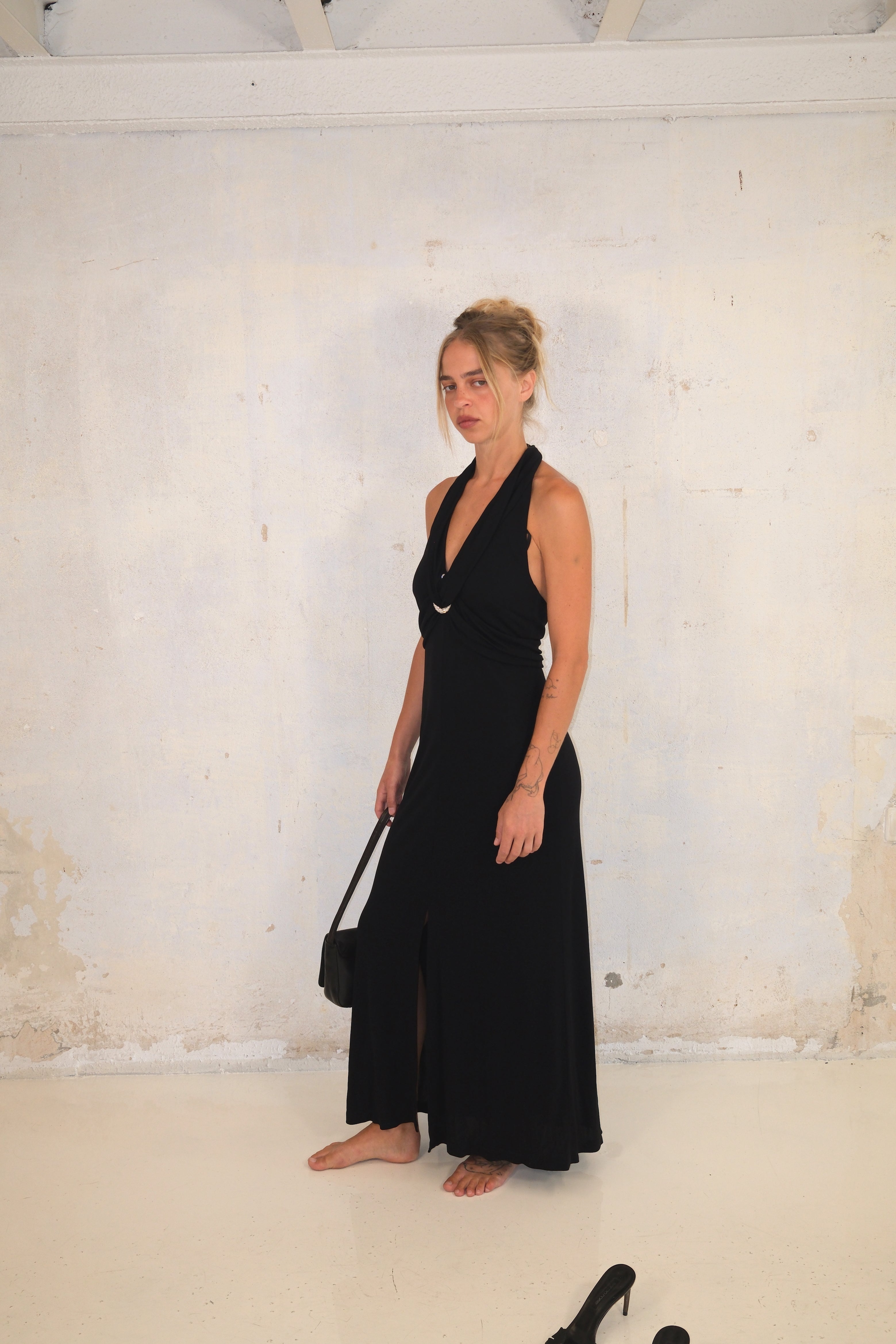 Black Maxi Dress With Deep Cut And Silver Detail