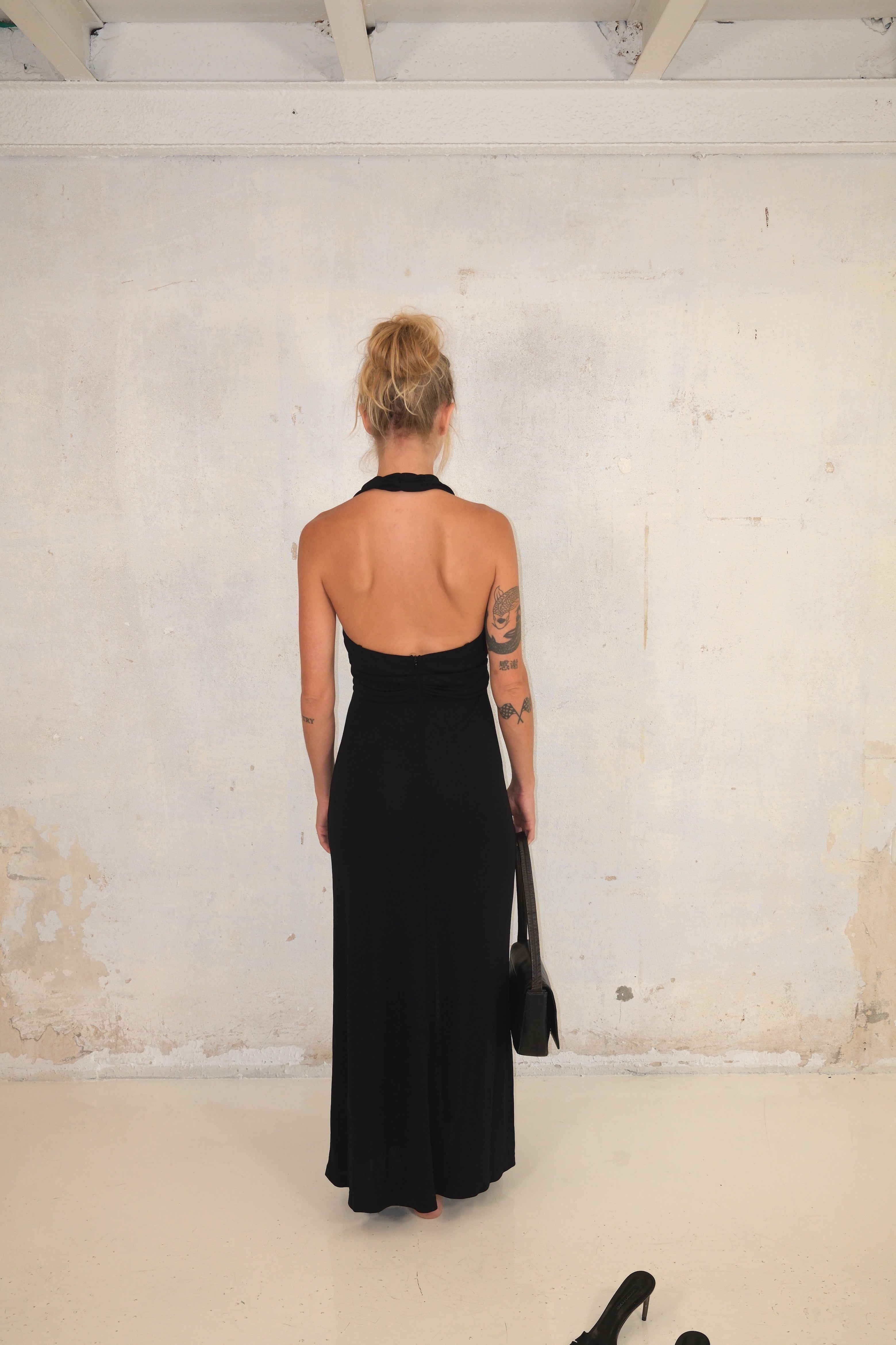 Black Maxi Dress With Deep Cut And Silver Detail