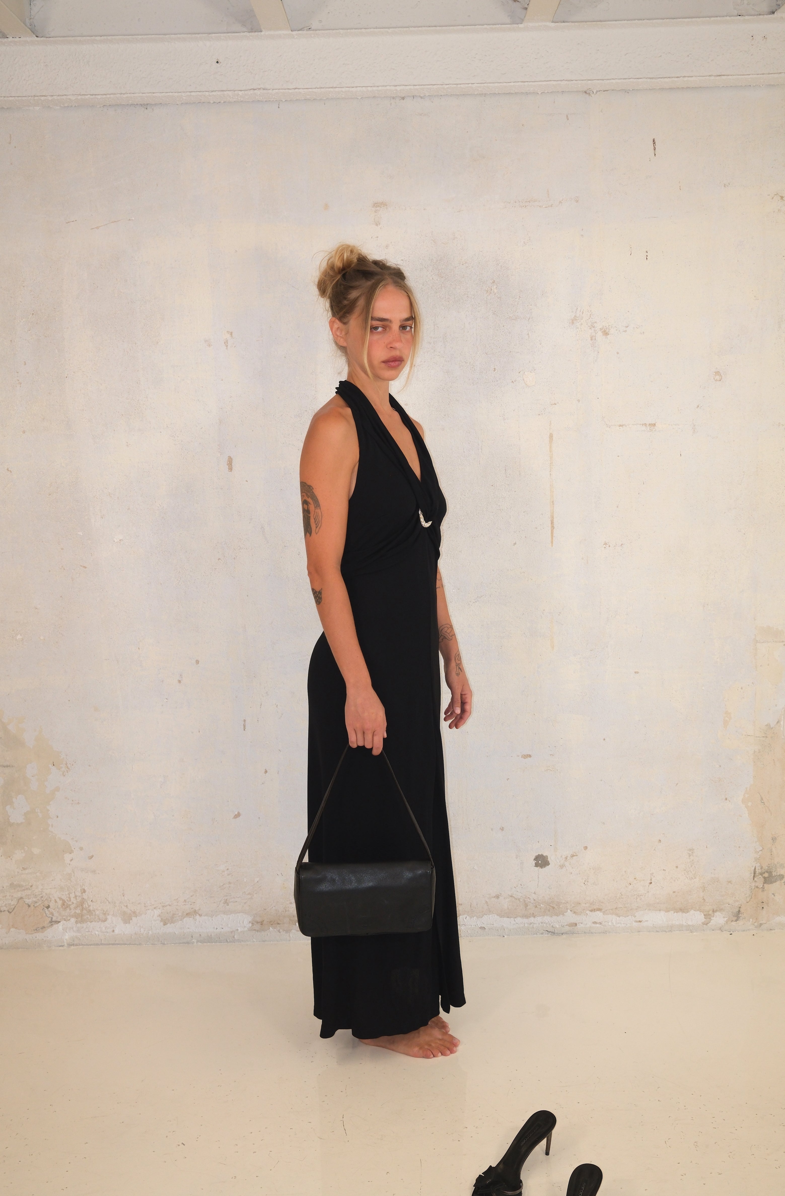 Black Maxi Dress With Deep Cut And Silver Detail