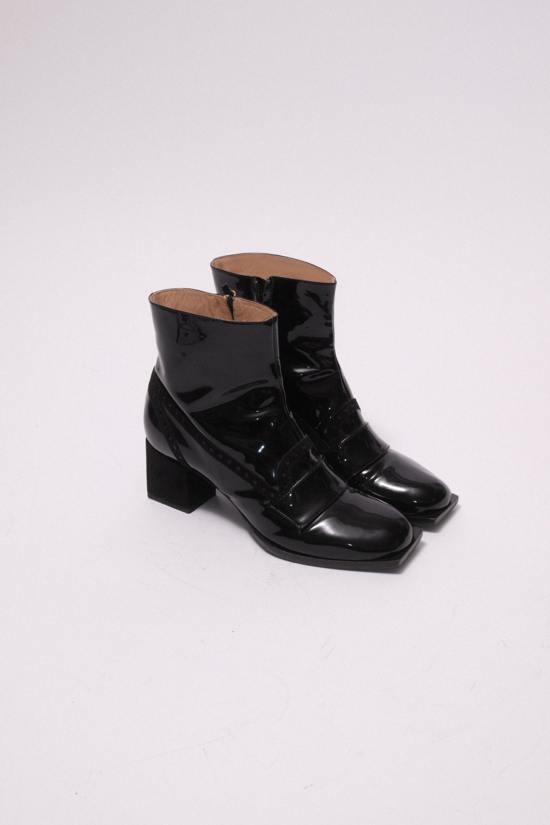 Viktore and Rolf patent leather ankle boots in black