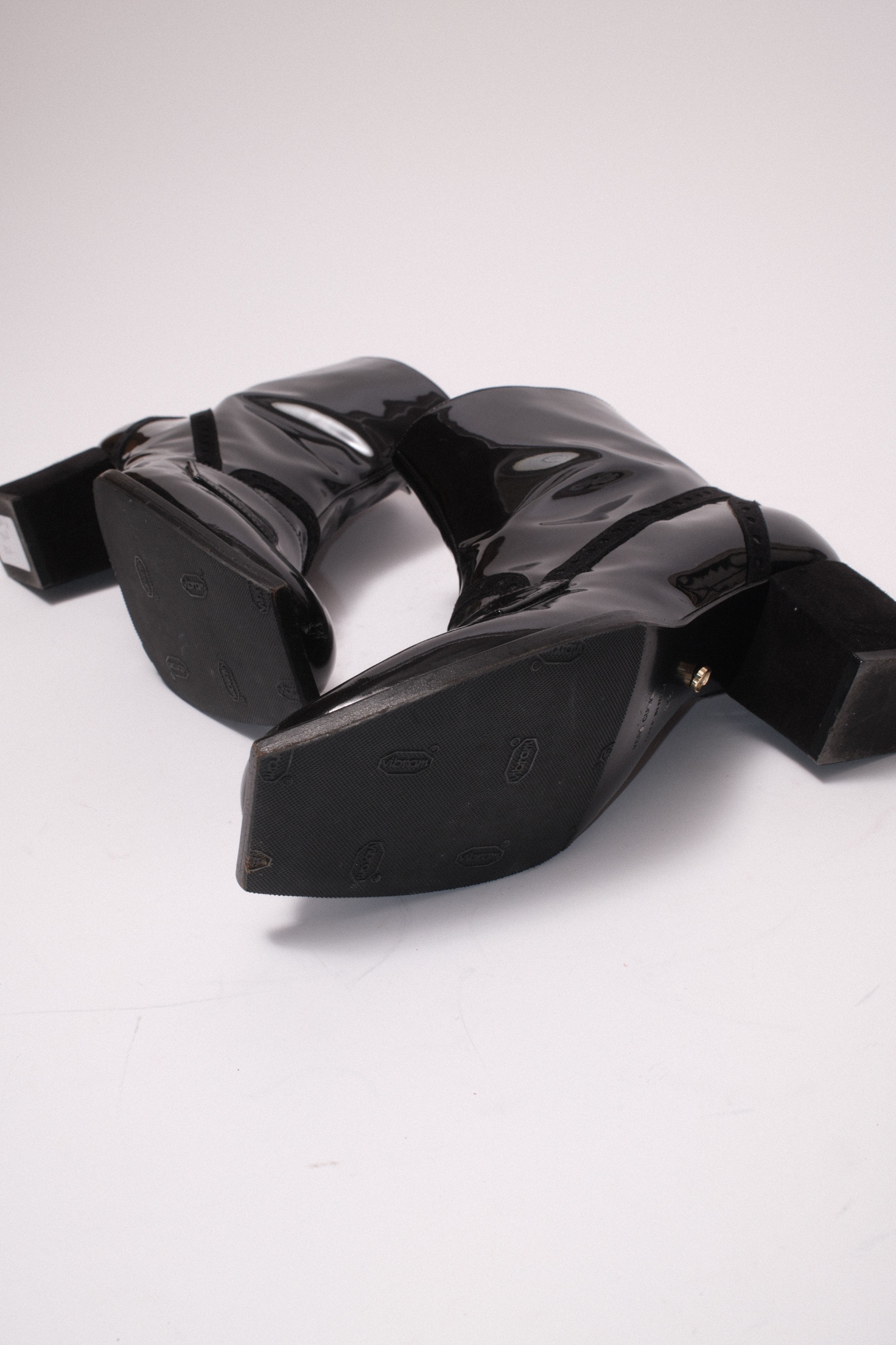Viktore and Rolf patent leather ankle boots in black
