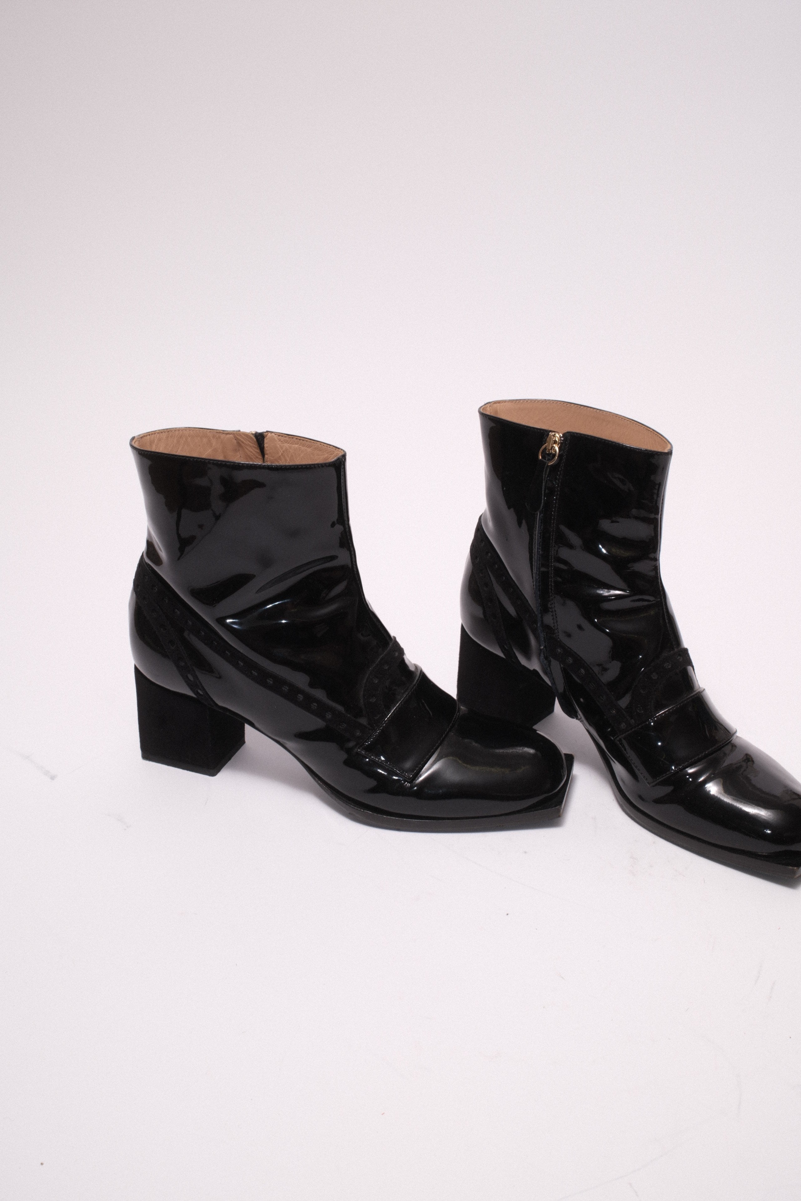 Viktore and Rolf patent leather ankle boots in black