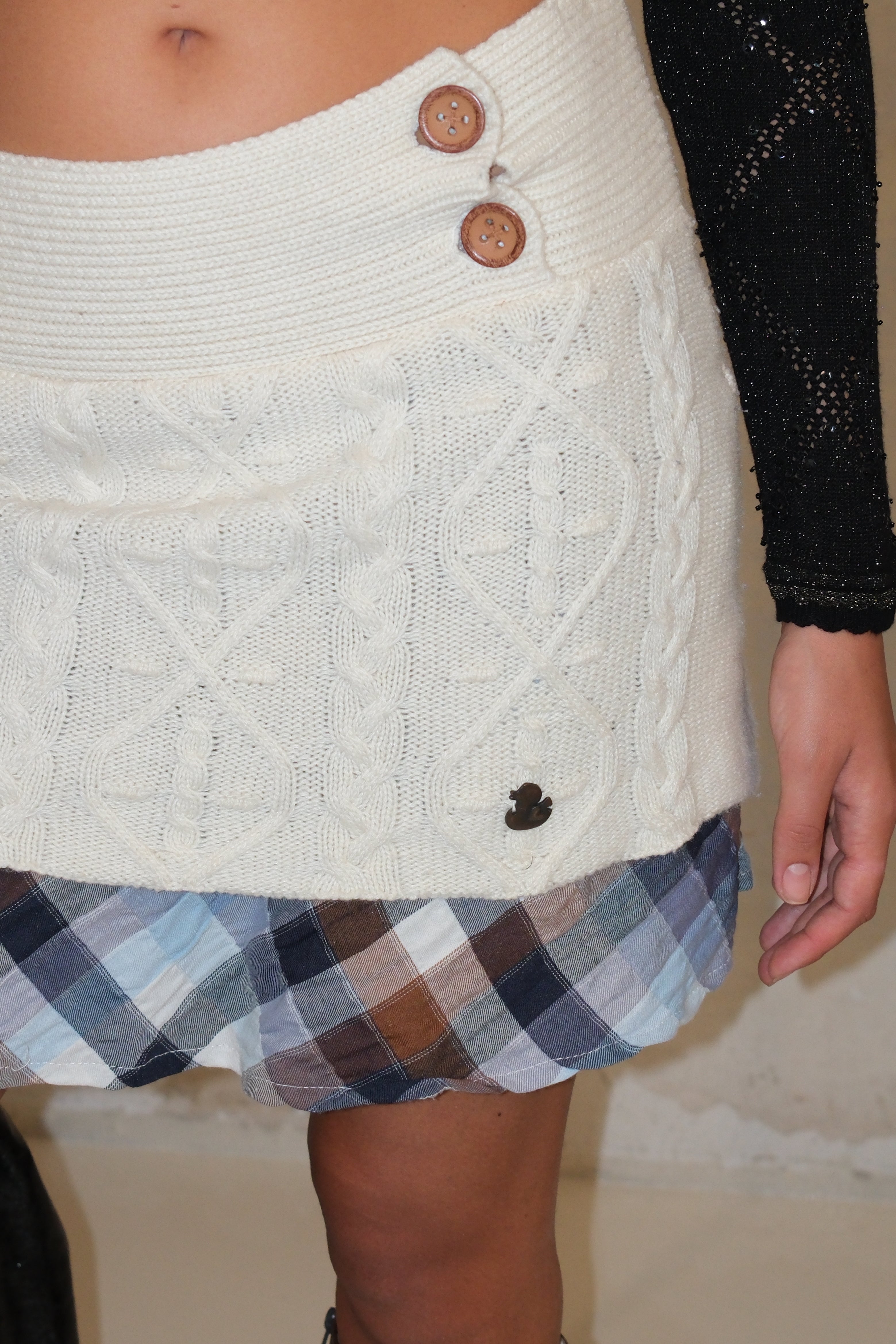 Knitted Skirt With Buttons And Checkered Layer Underneath