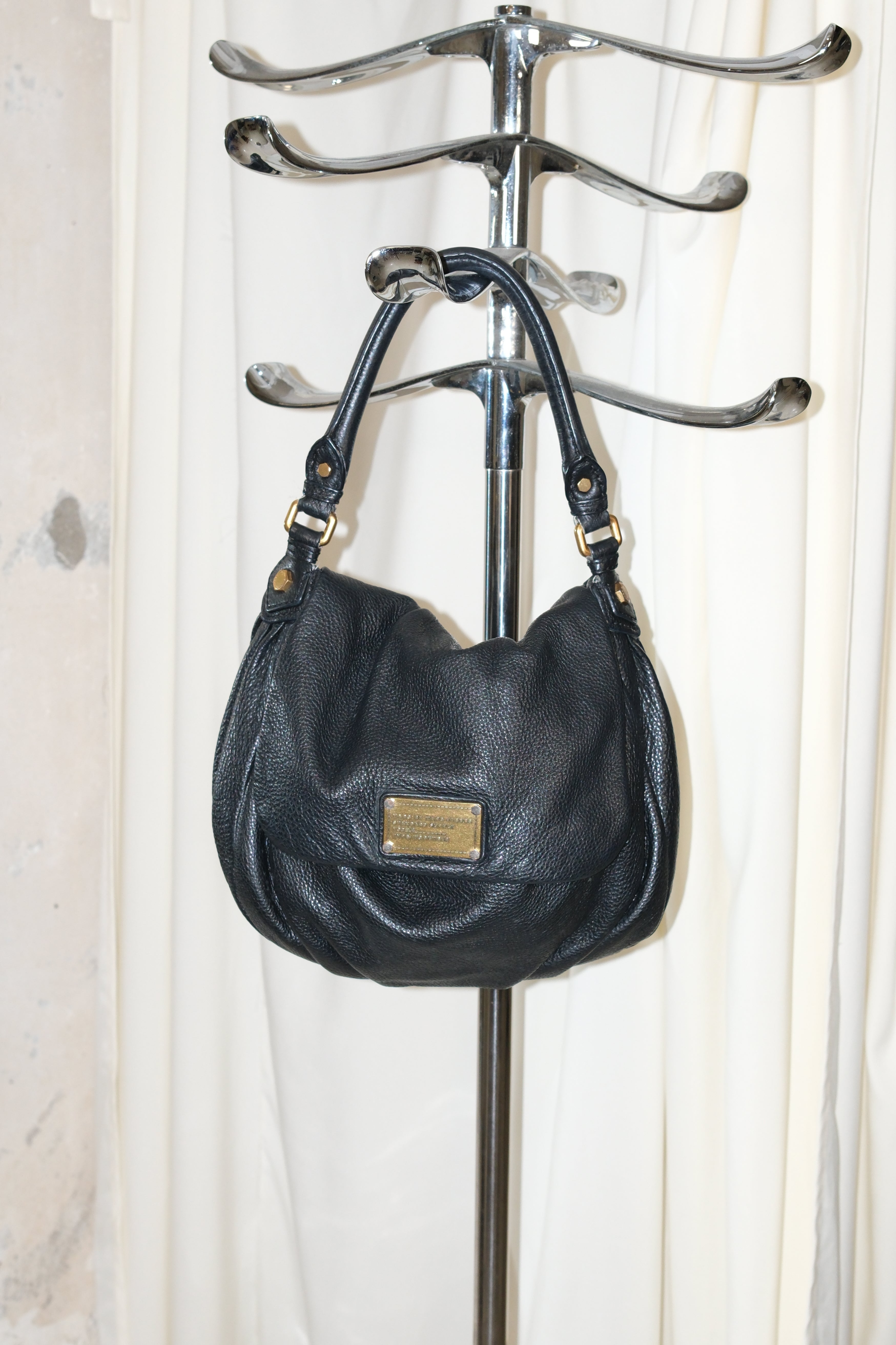 Marc Jacobs black shoulder bag with magnetic snap closure