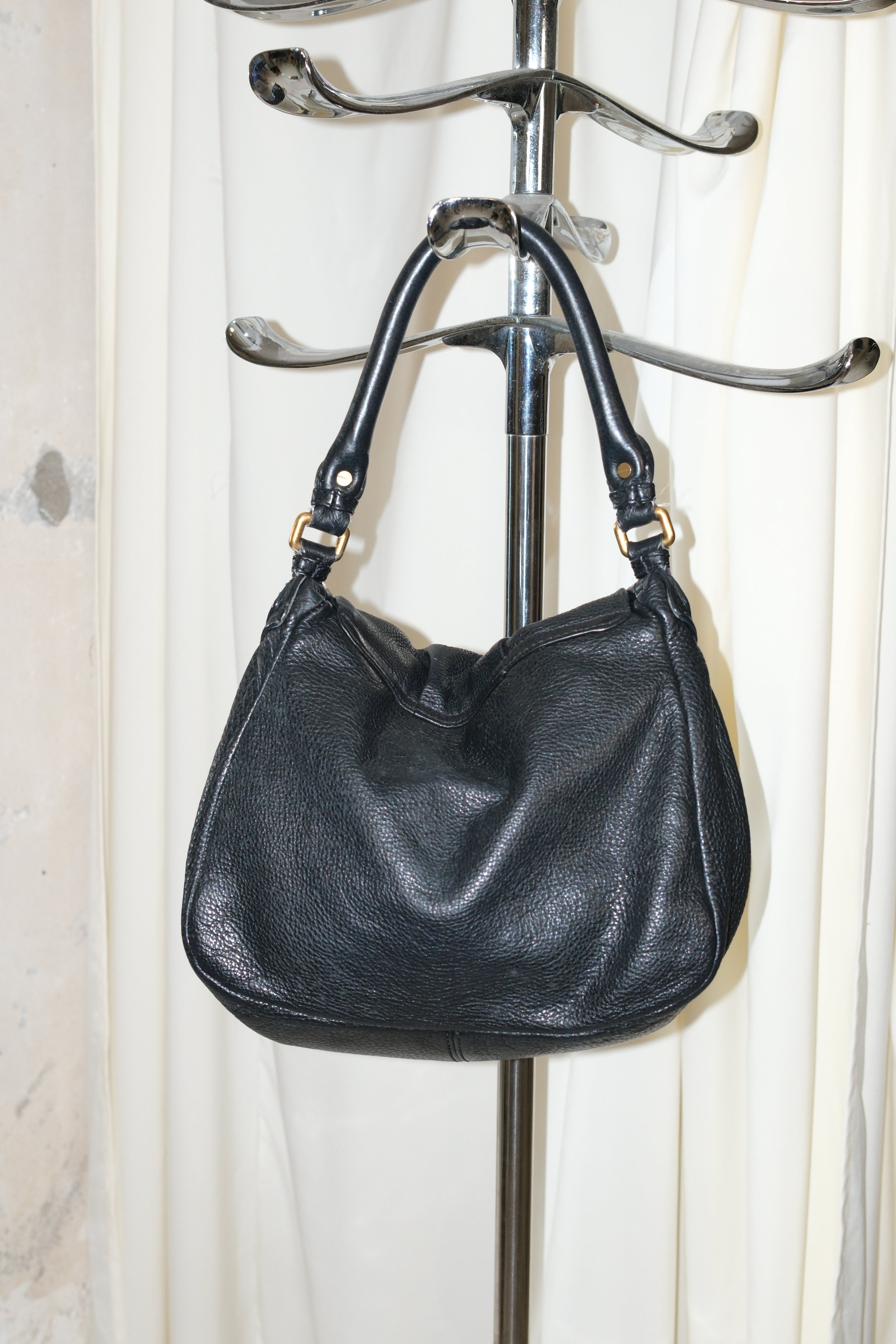 Marc Jacobs black shoulder bag with magnetic snap closure