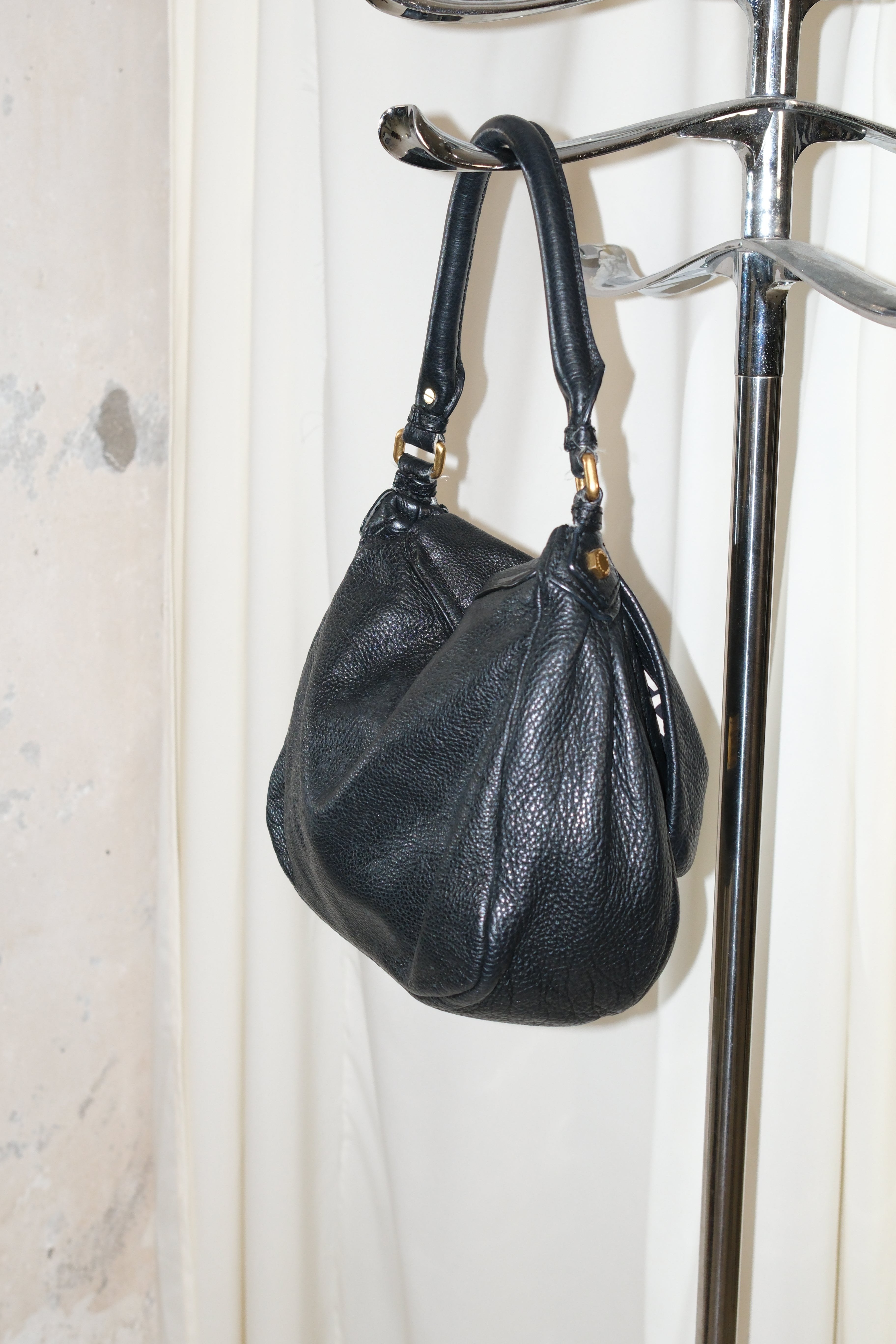 Marc Jacobs black shoulder bag with magnetic snap closure