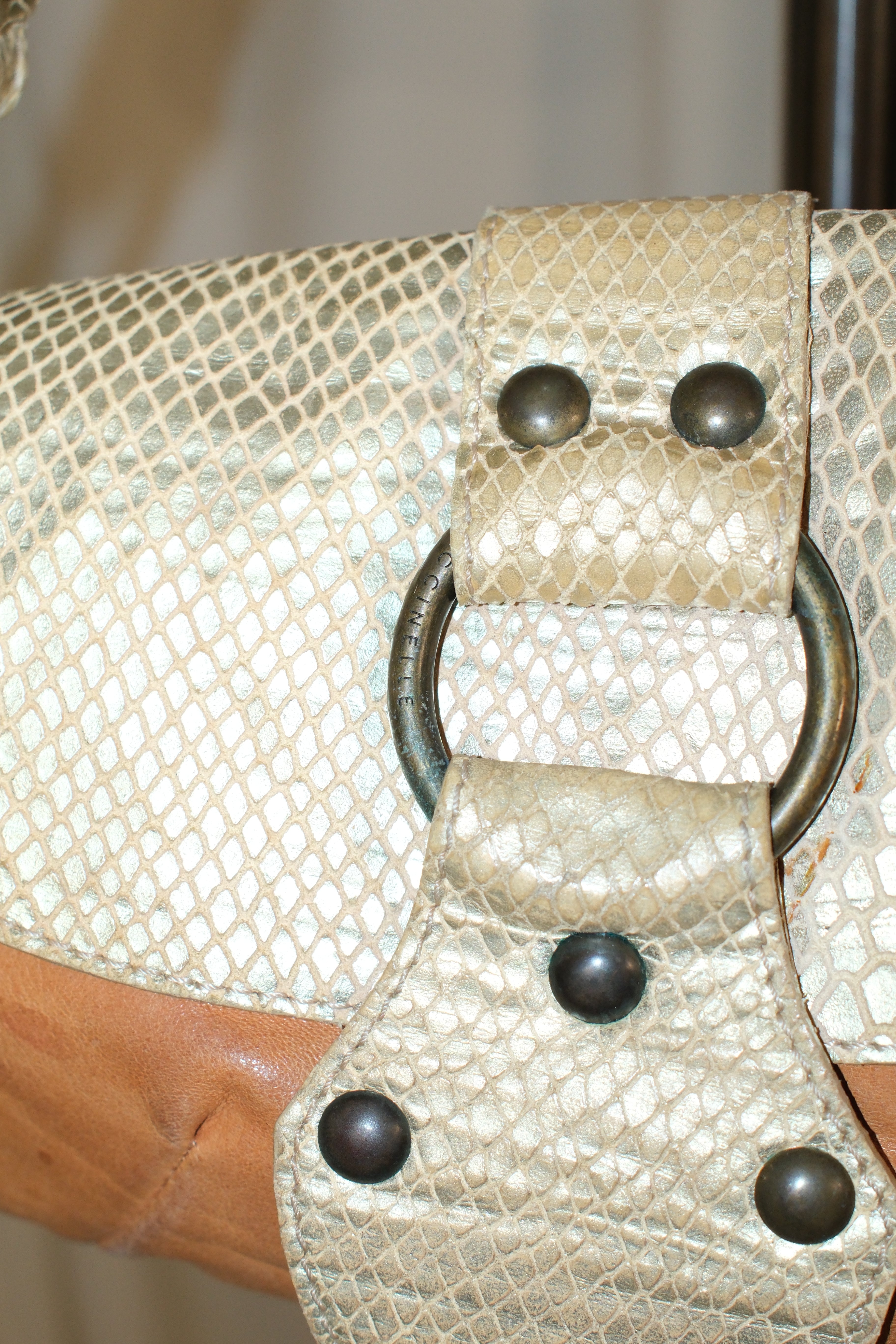 Coccinelle leather shoulder bag with big metal hardware