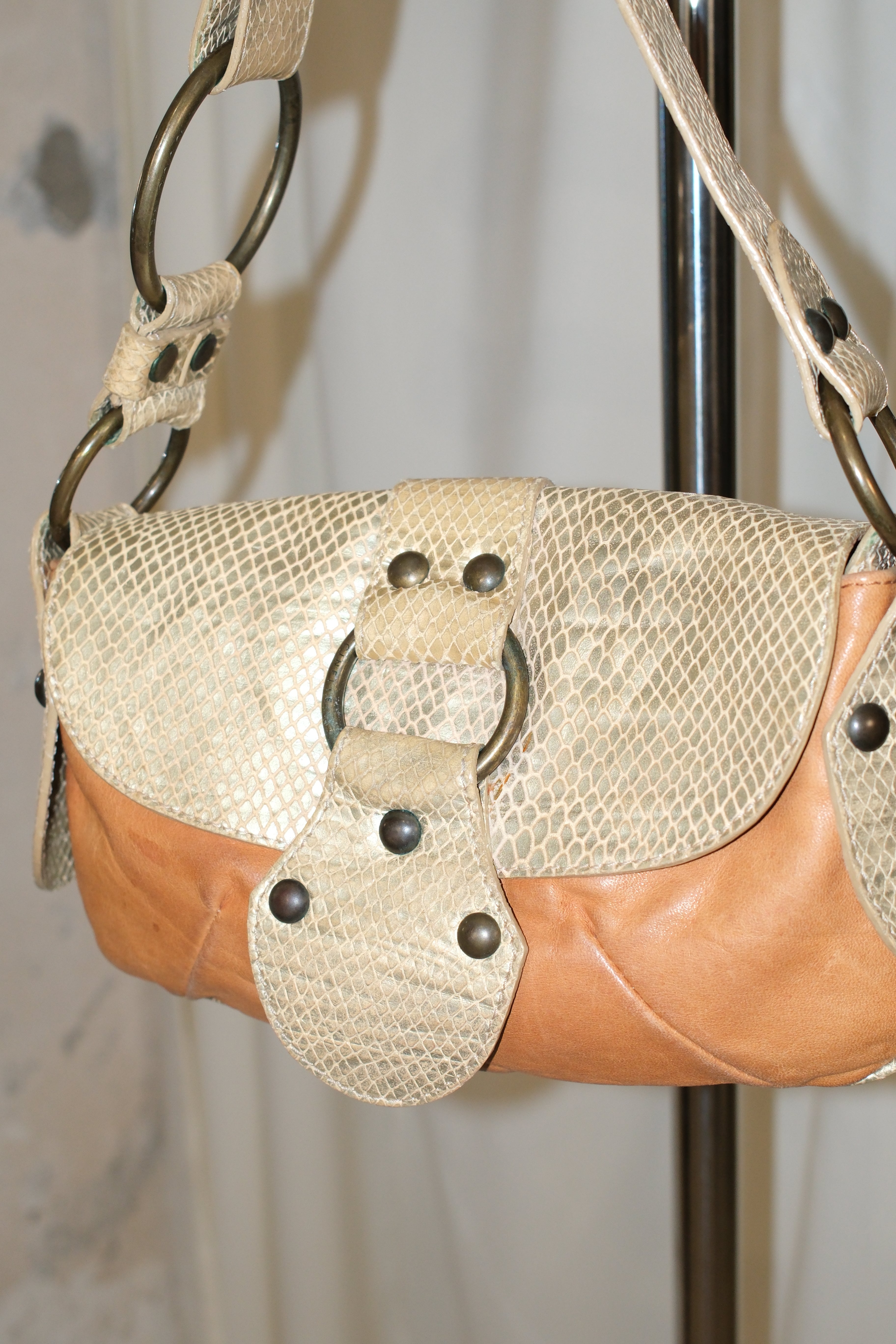 Coccinelle leather shoulder bag with big metal hardware