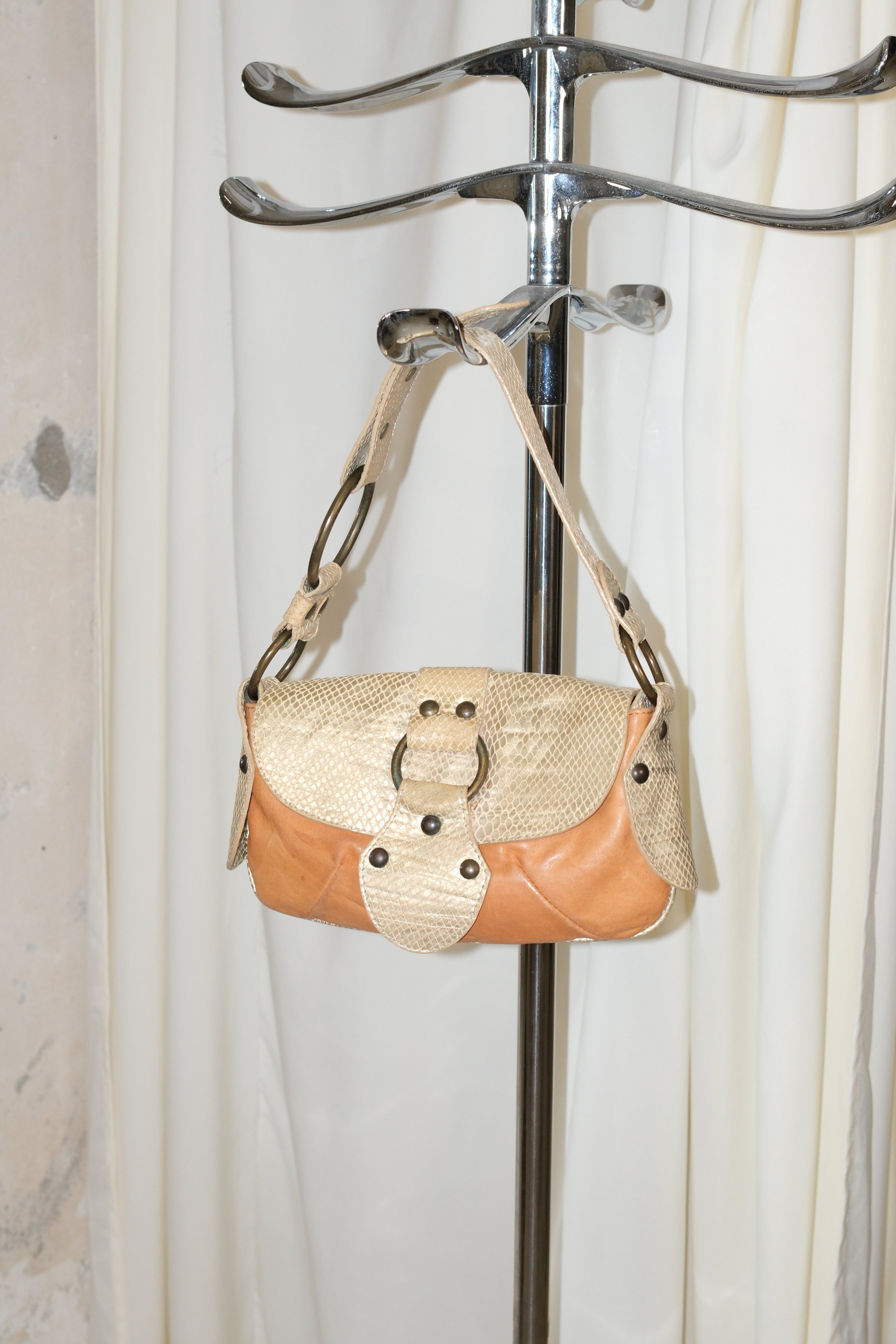 Coccinelle leather shoulder bag with big metal hardware
