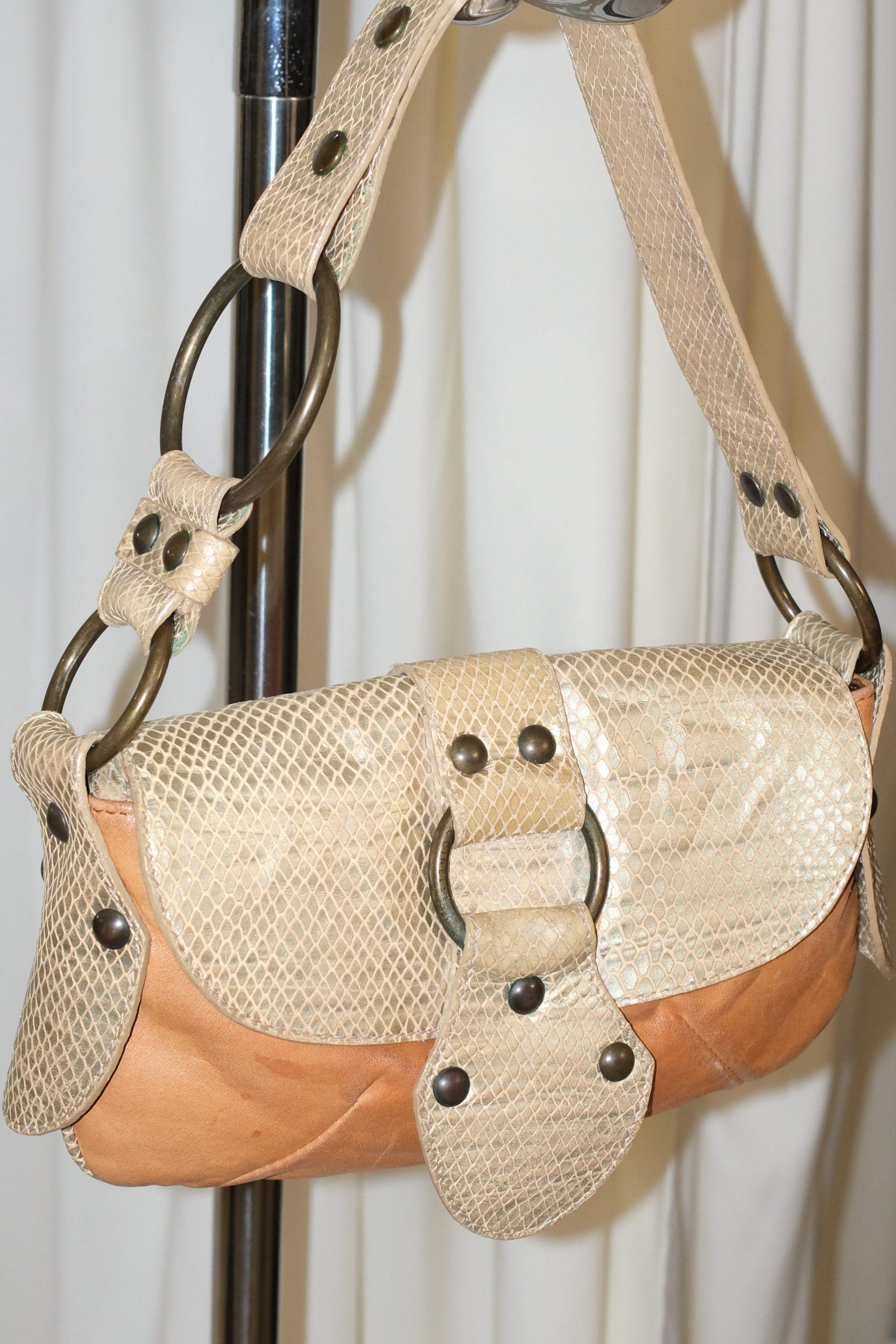 Coccinelle leather shoulder bag with big metal hardware
