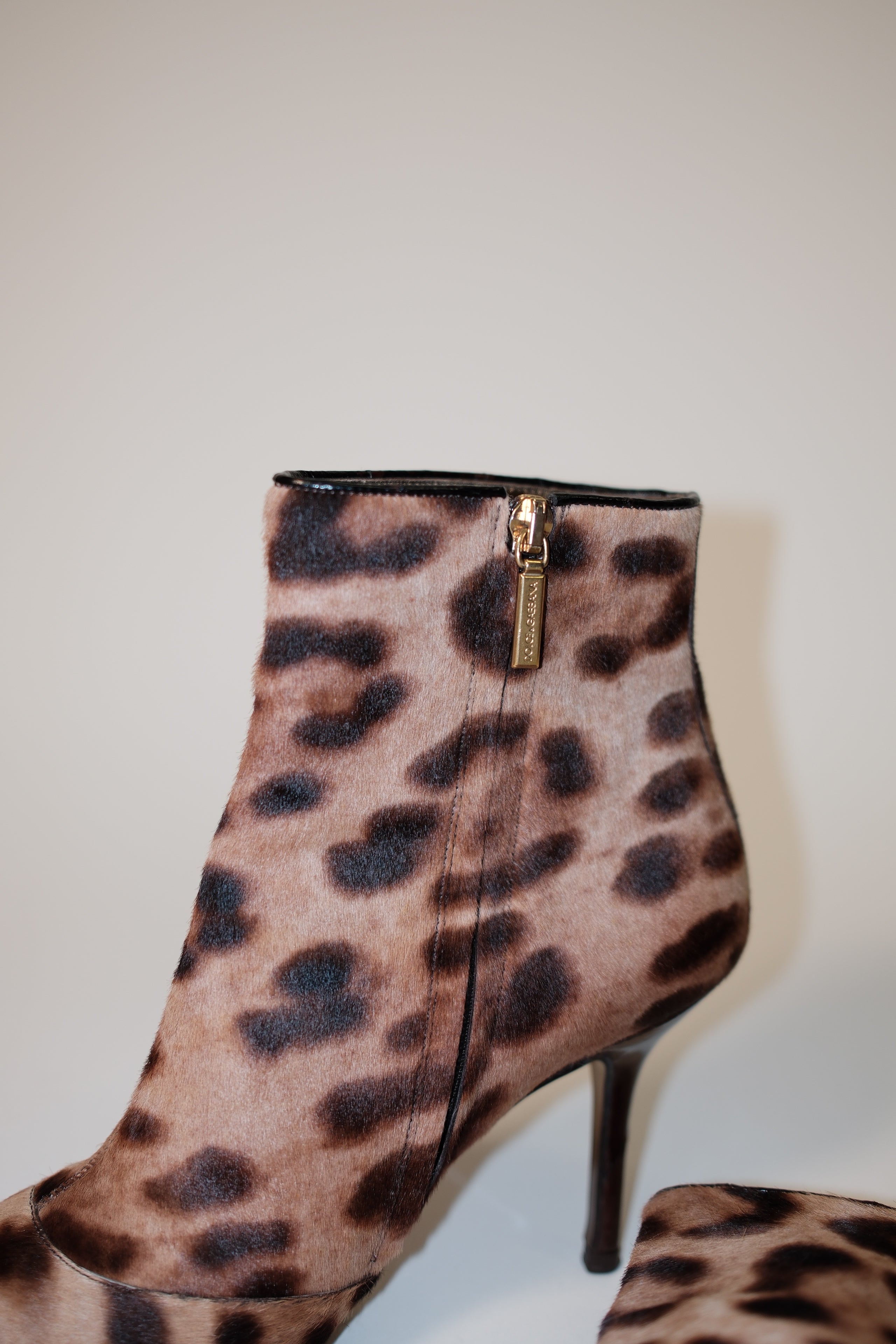 Dolce Gabbana furry leather pointed toe ankle boots