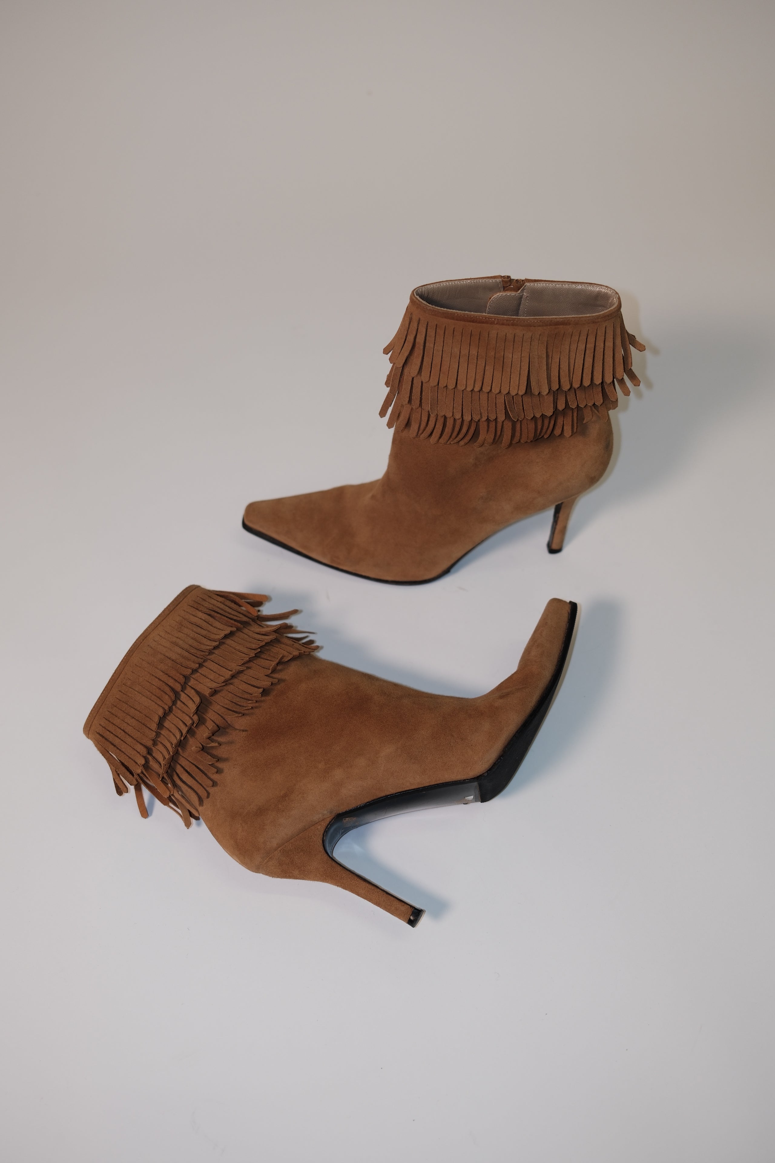 Stuart Weitzman fringe ankle boots in camel