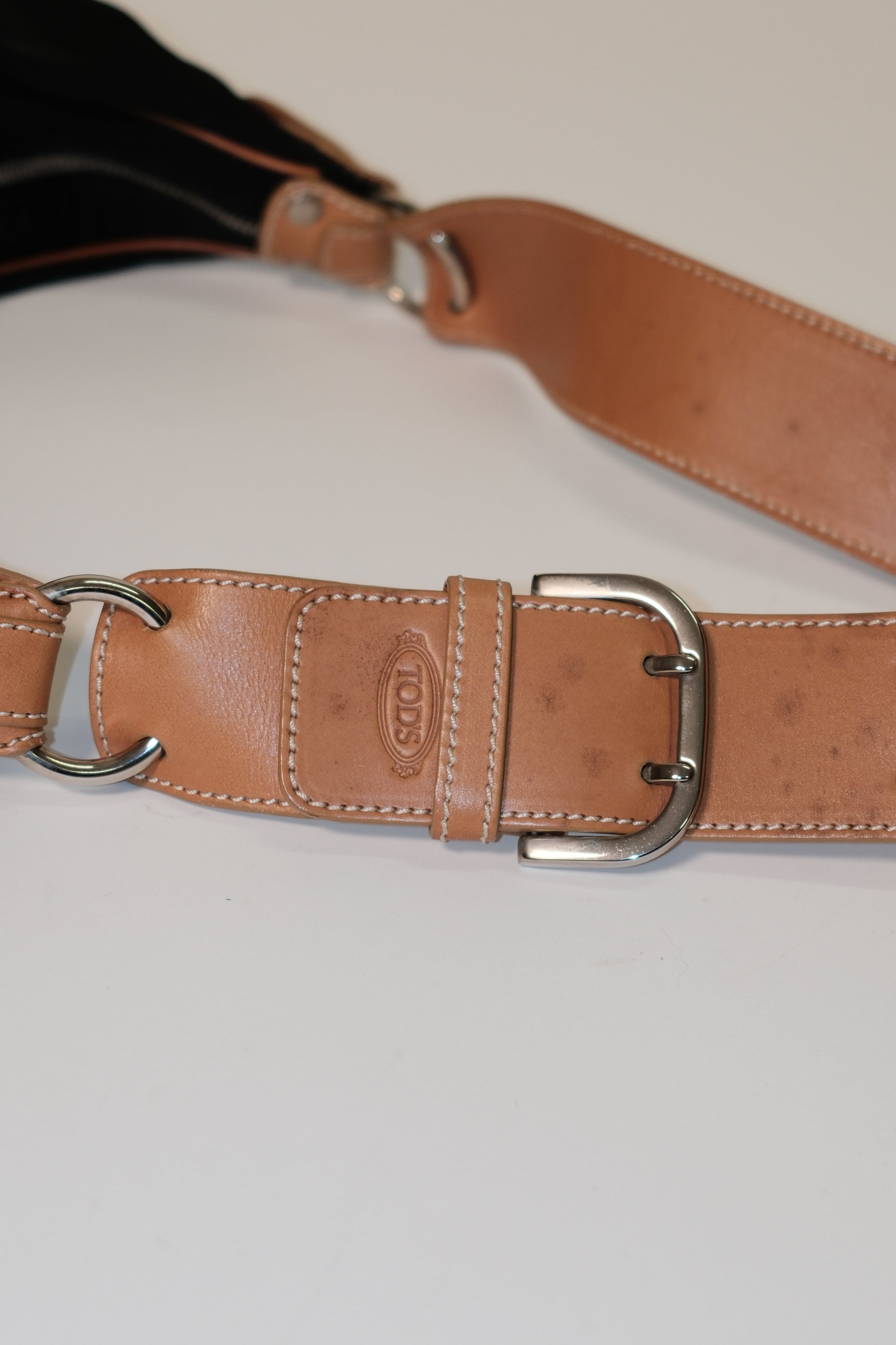 Tod's long strap cross body bag in black canvas and tan leather