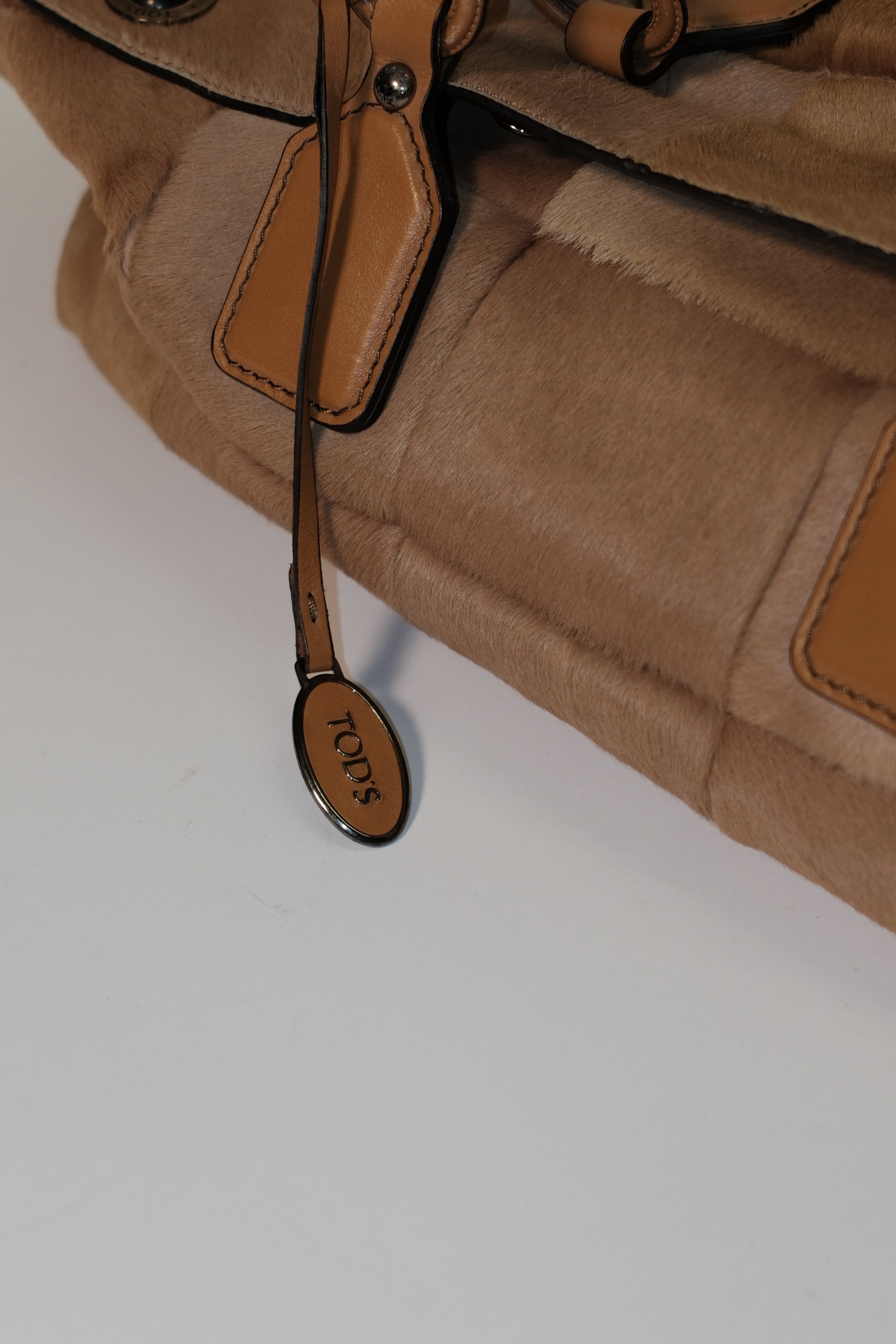 Tod's furry patch work leather in toffee color