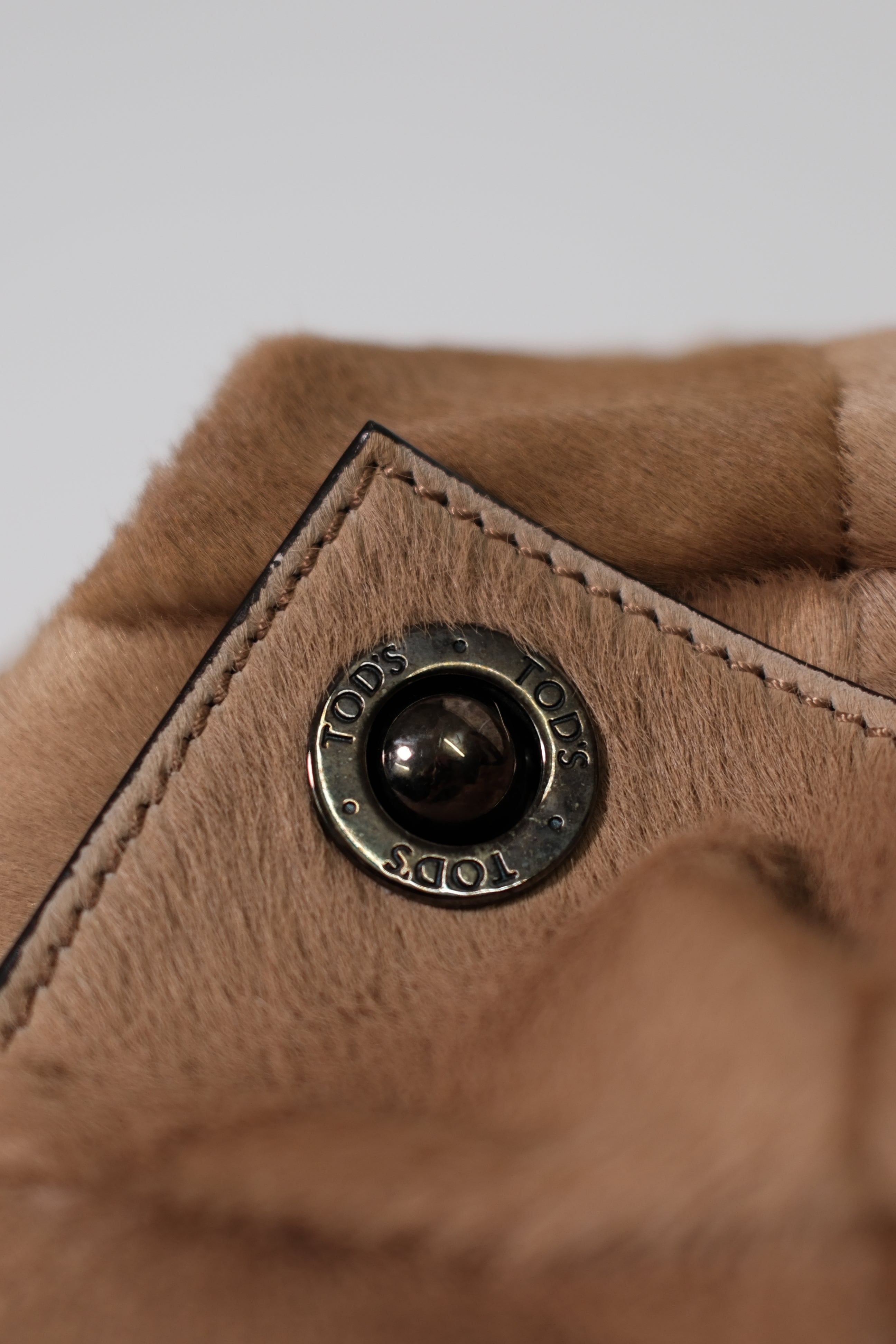 Tod's furry patch work leather in toffee color