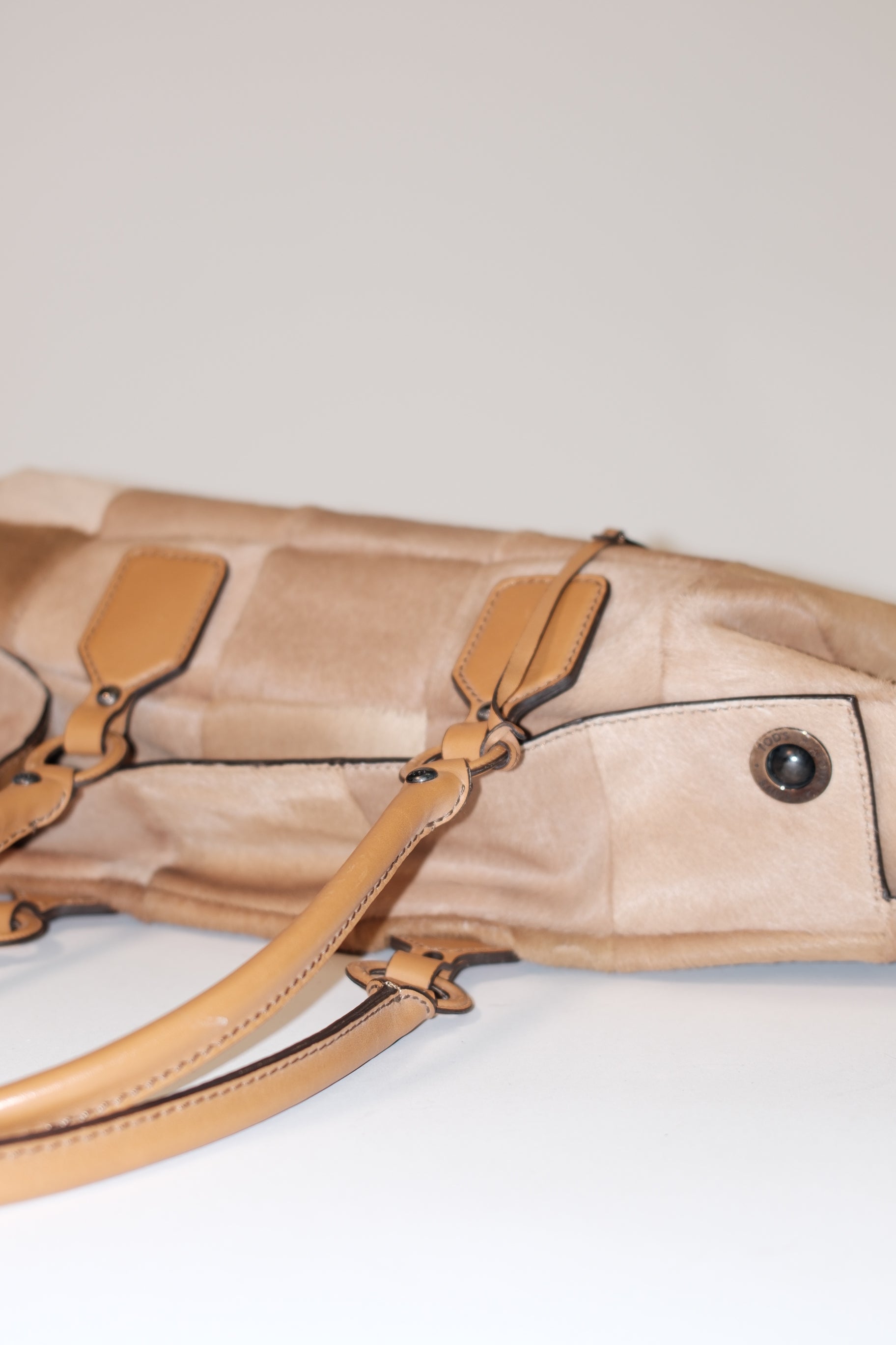 Tod's furry patch work leather in toffee color