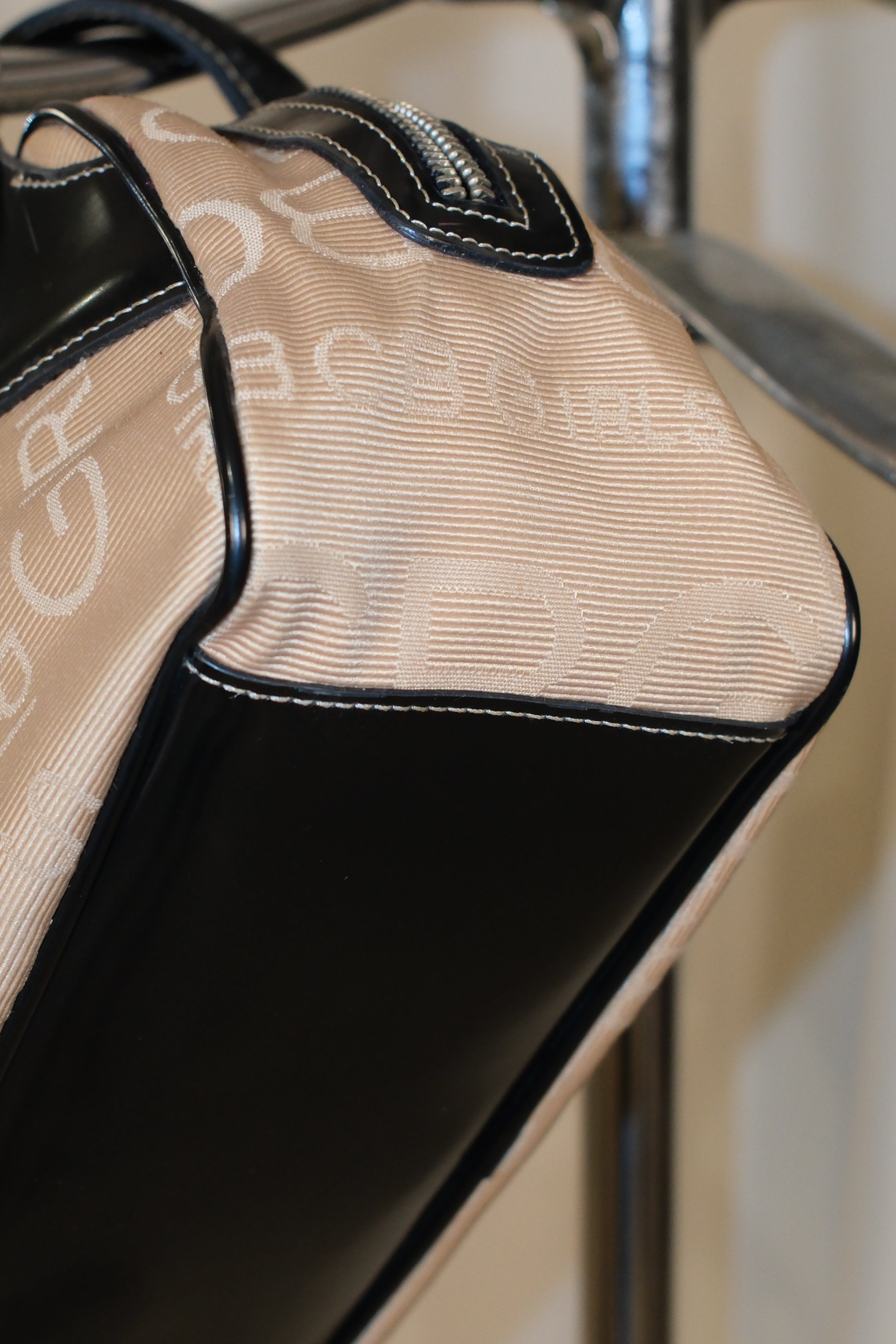 BCBG MAXIMIZER MONOGRAM CANVAS BOWLING BAG