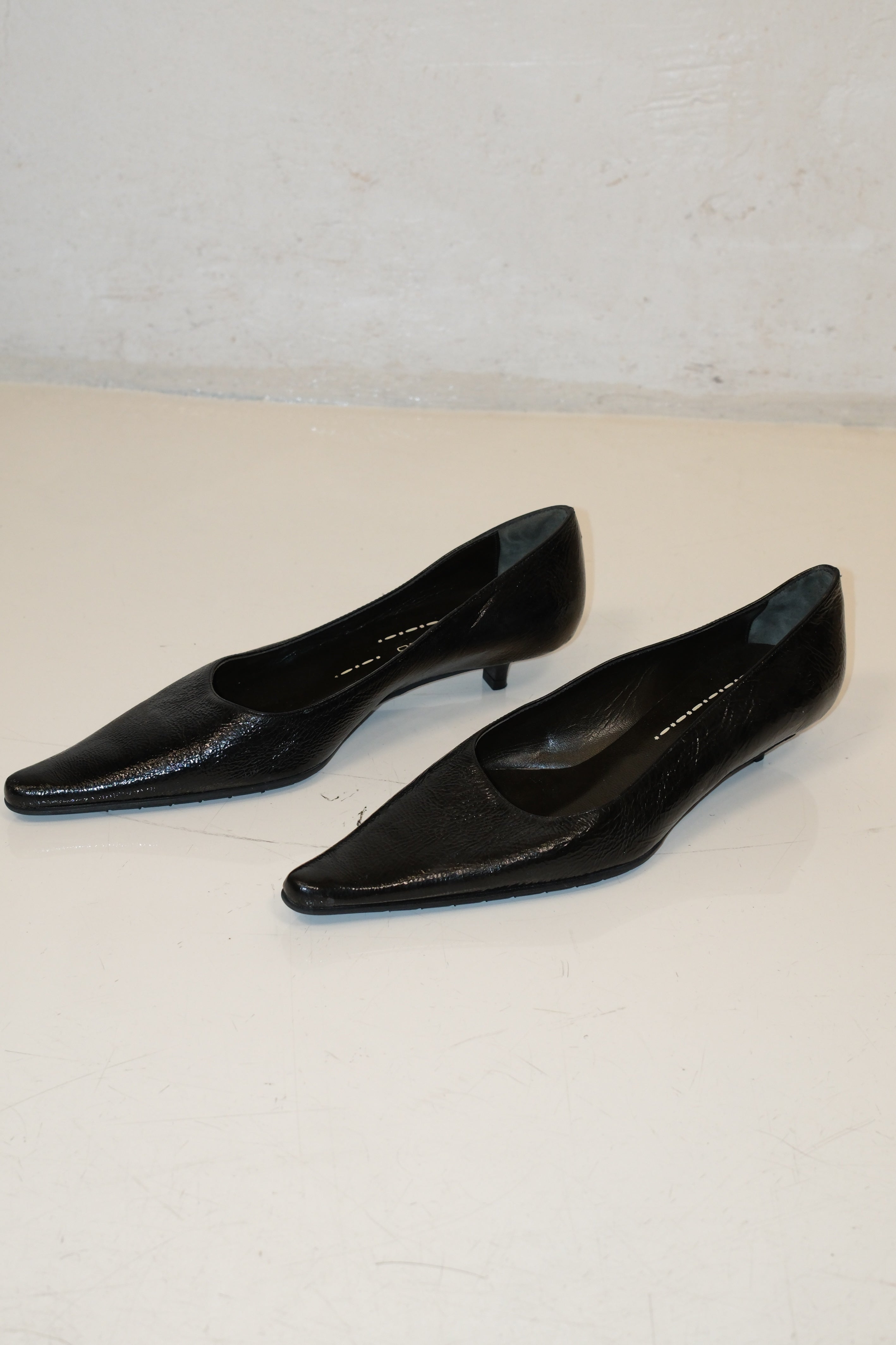 Italian pointed toe kitten heels in black patent leather