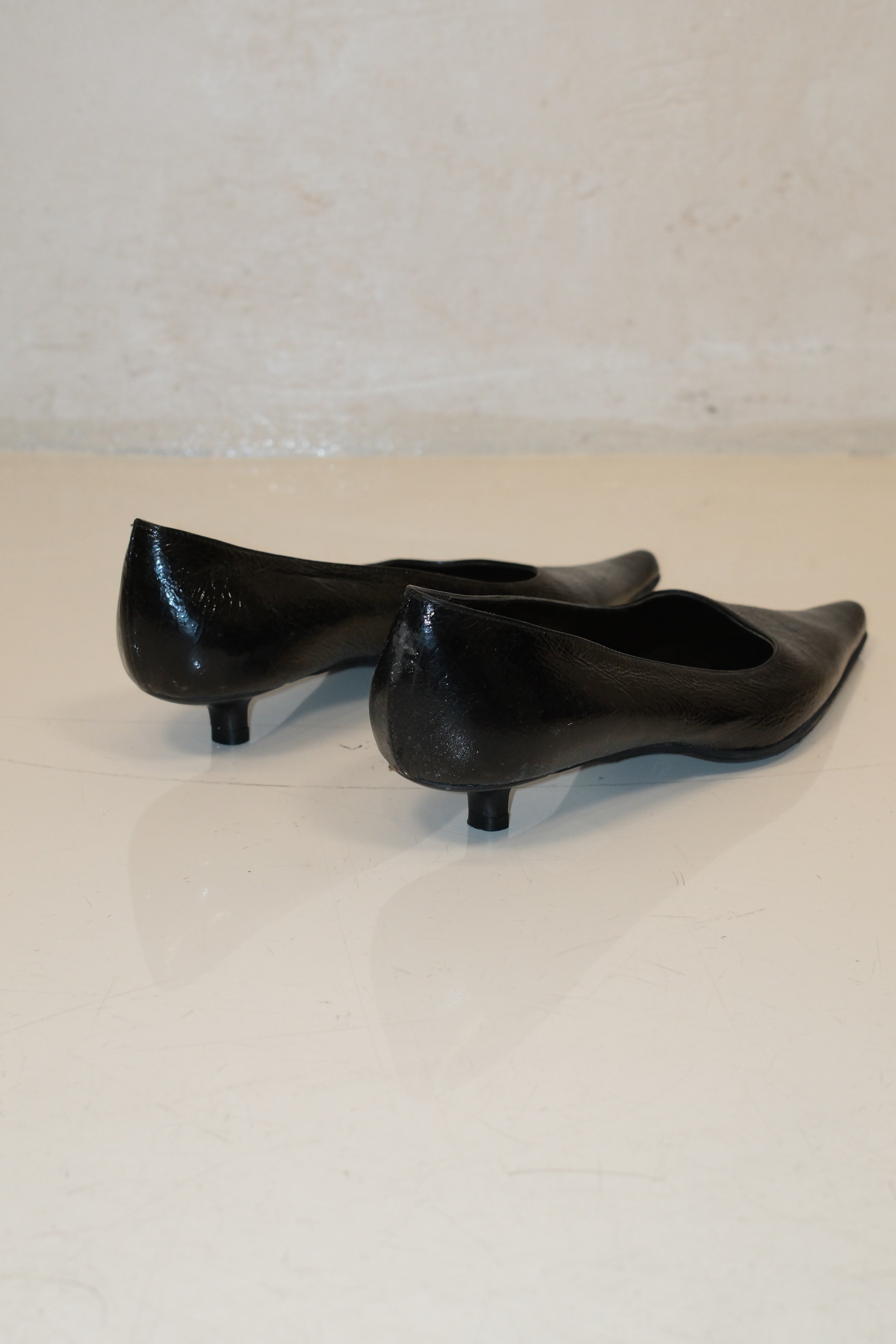 Italian pointed toe kitten heels in black patent leather