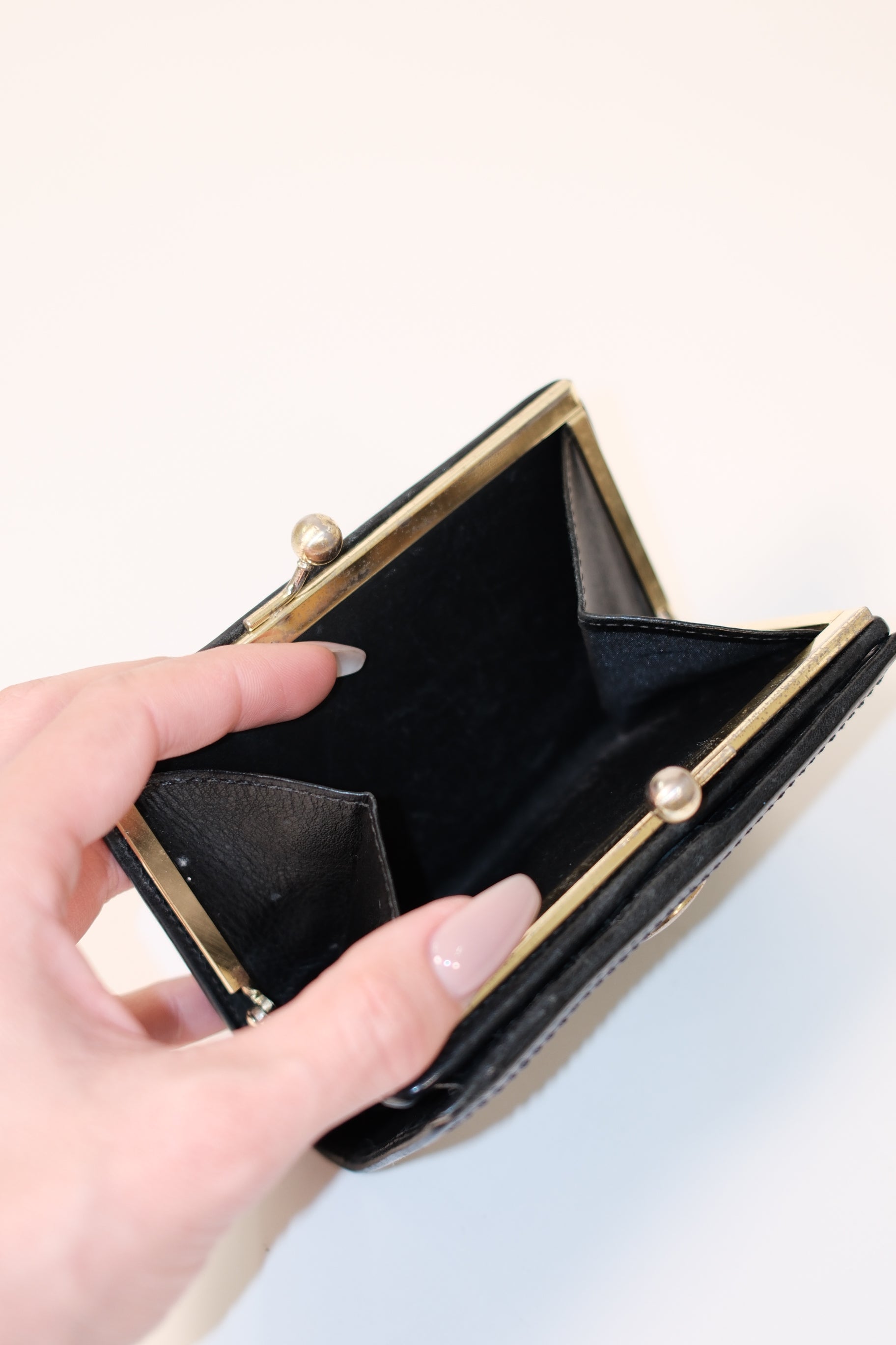 Coach black leather wallet with gold hardware