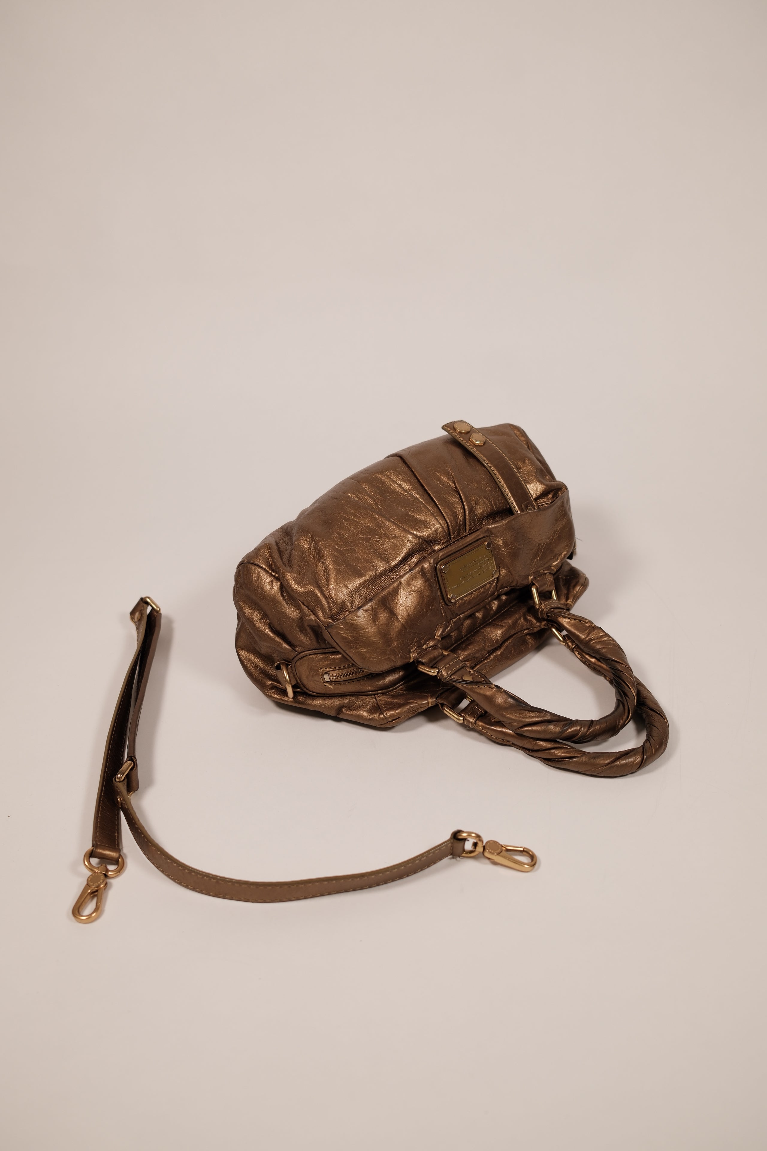 Marc jacobs gold metallic handbag with twisted handles