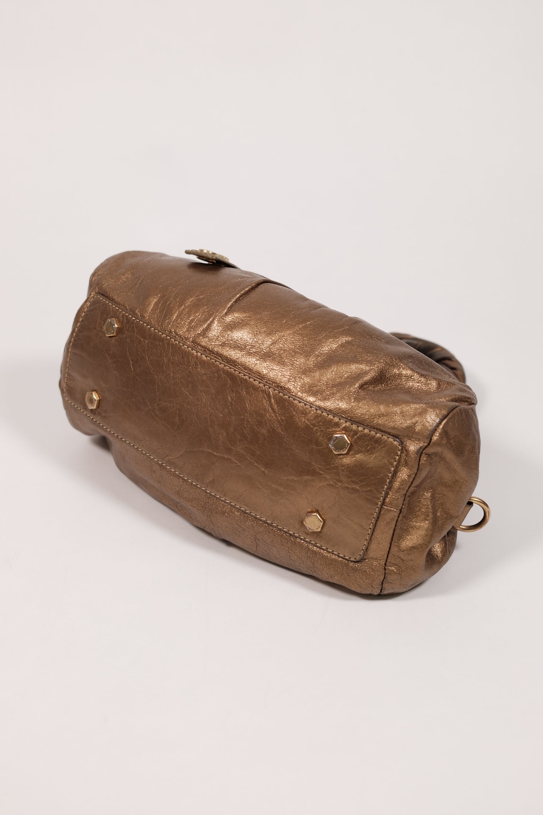 Marc jacobs gold metallic handbag with twisted handles