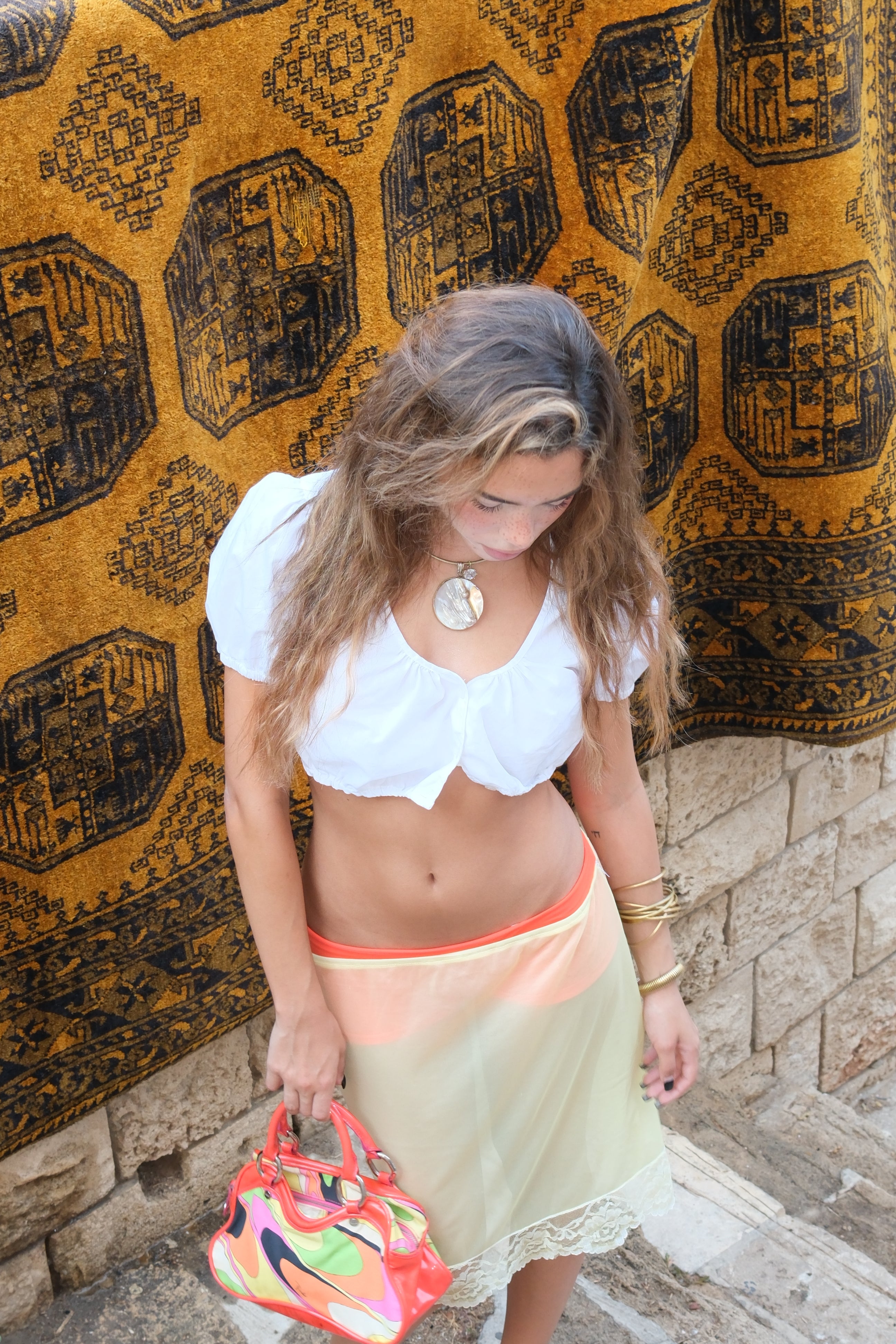 Sheer yellow midi skirt with lace hem
