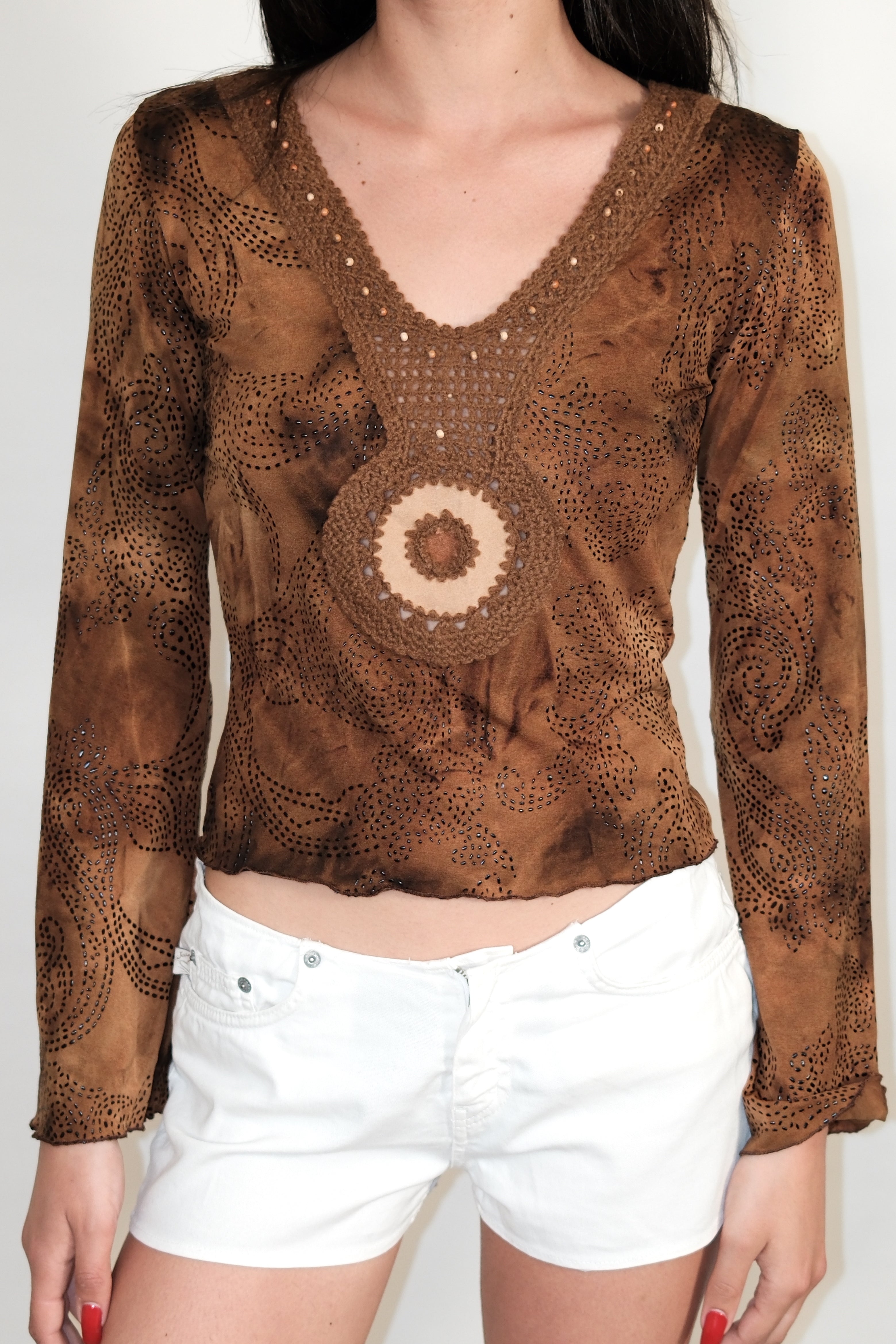 Long-Sleeve Crop Top with Crochet Detail and Decorative Elements