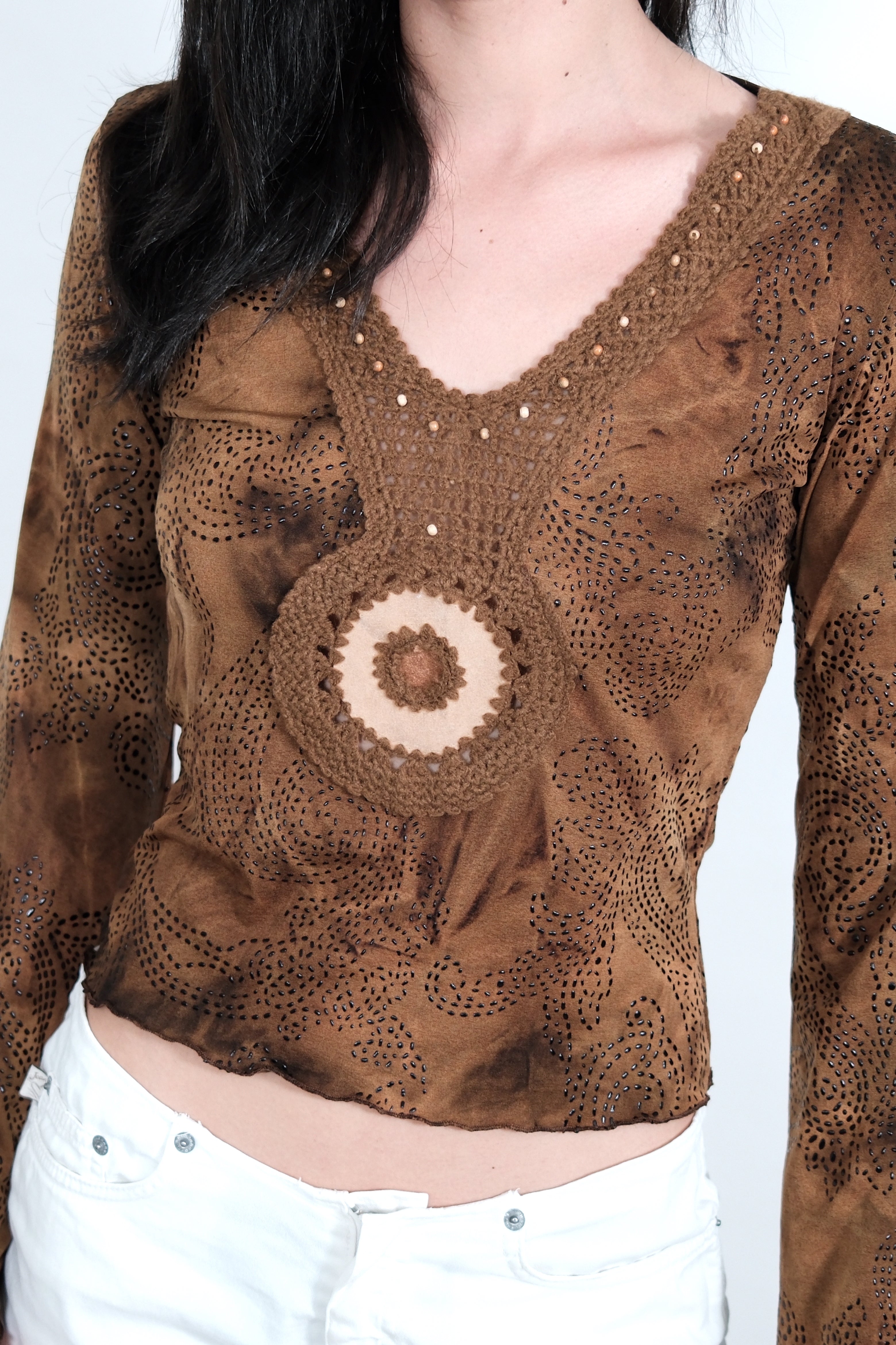 Long-Sleeve Crop Top with Crochet Detail and Decorative Elements