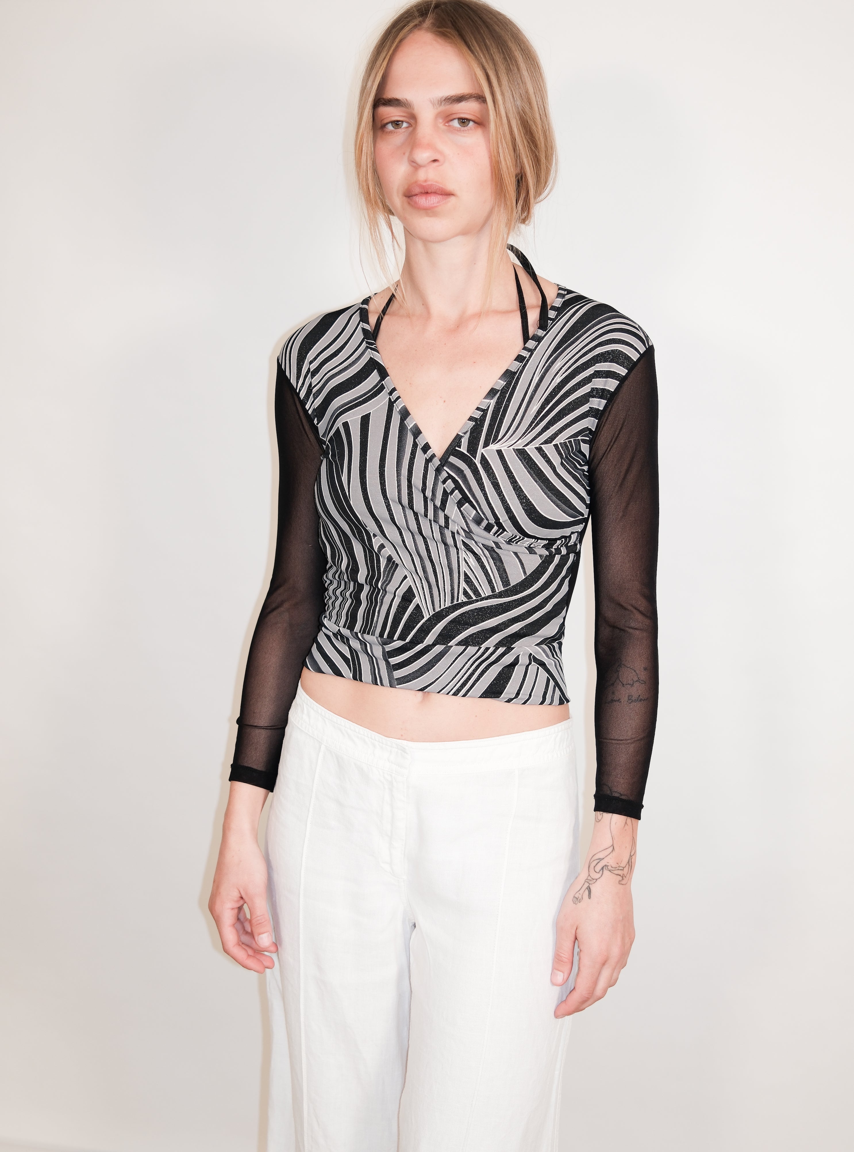 Black Wrap Top with Glitter Print and Sheer Back