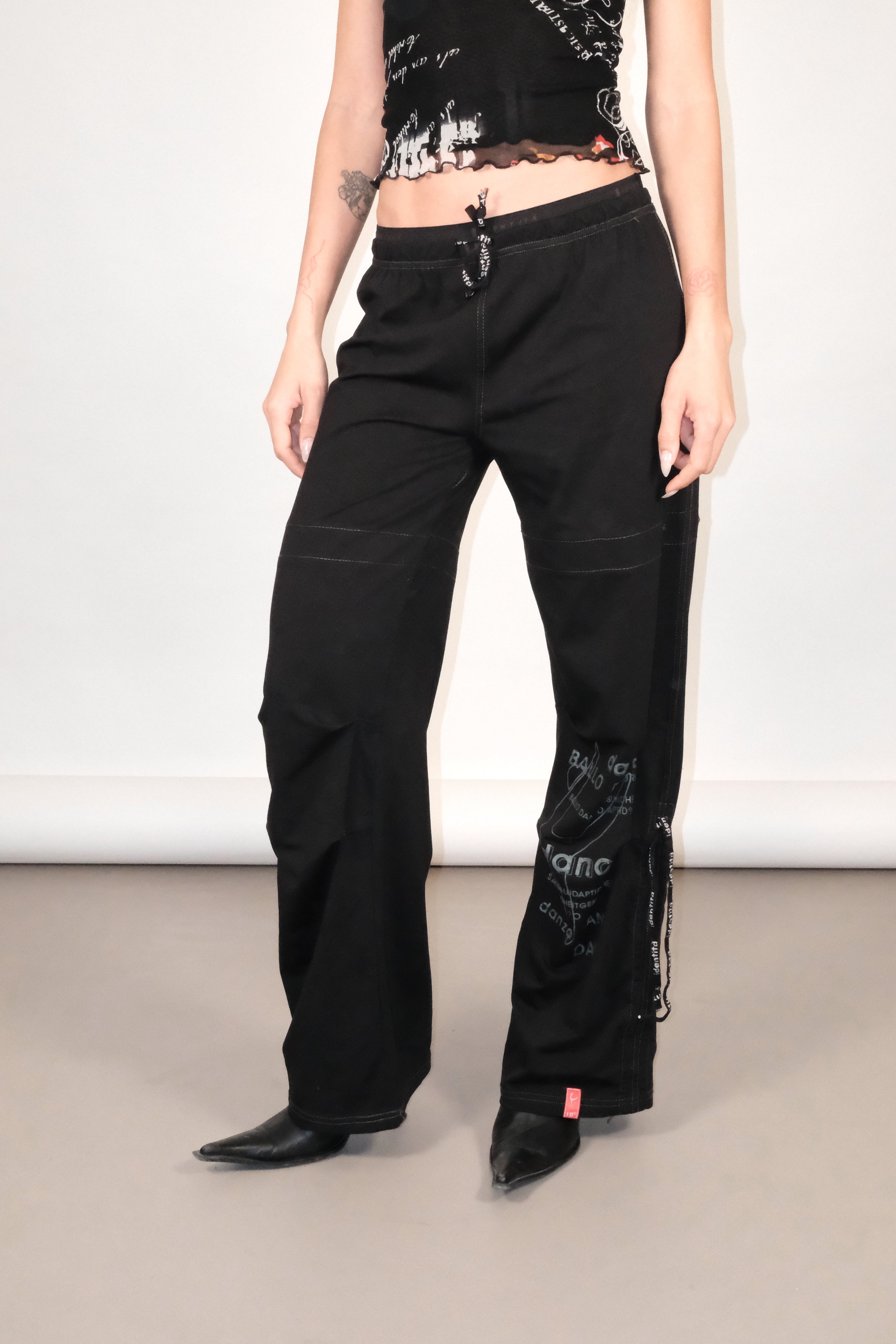 Black Drawstring Pants with Graphic Print and Adjustable Hems Size 36