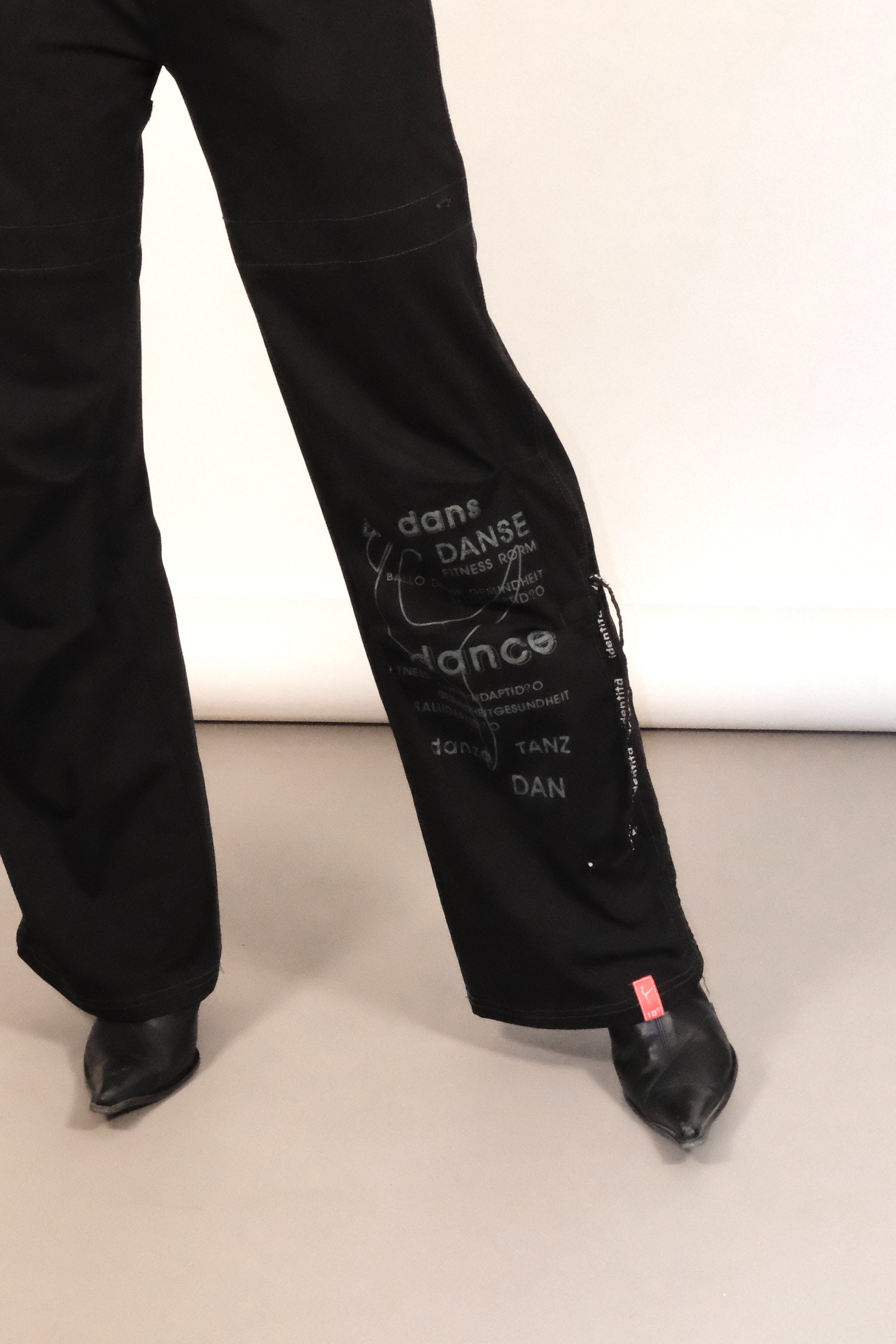 Black Drawstring Pants with Graphic Print and Adjustable Hems Size 36