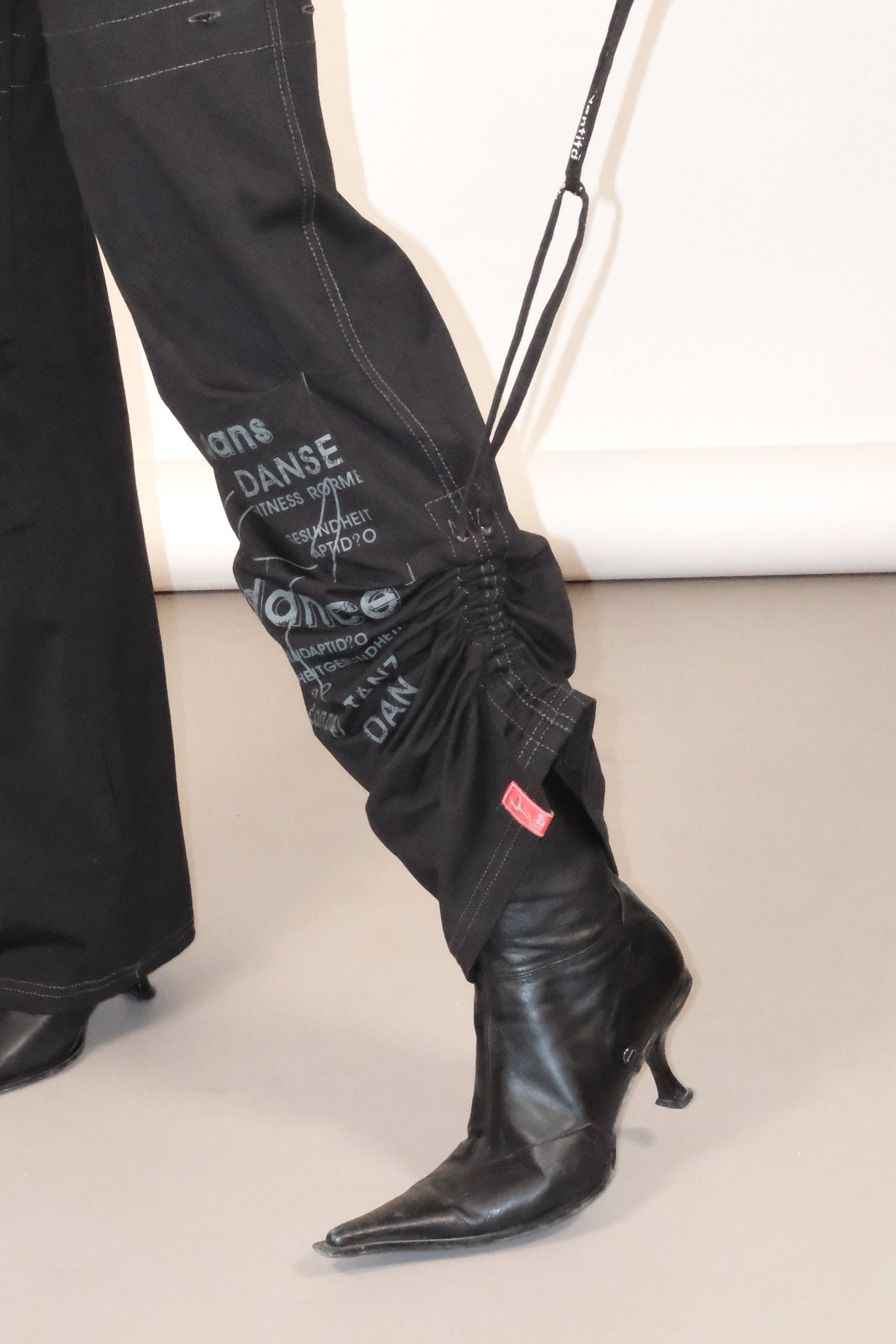 Black Drawstring Pants with Graphic Print and Adjustable Hems Size 36
