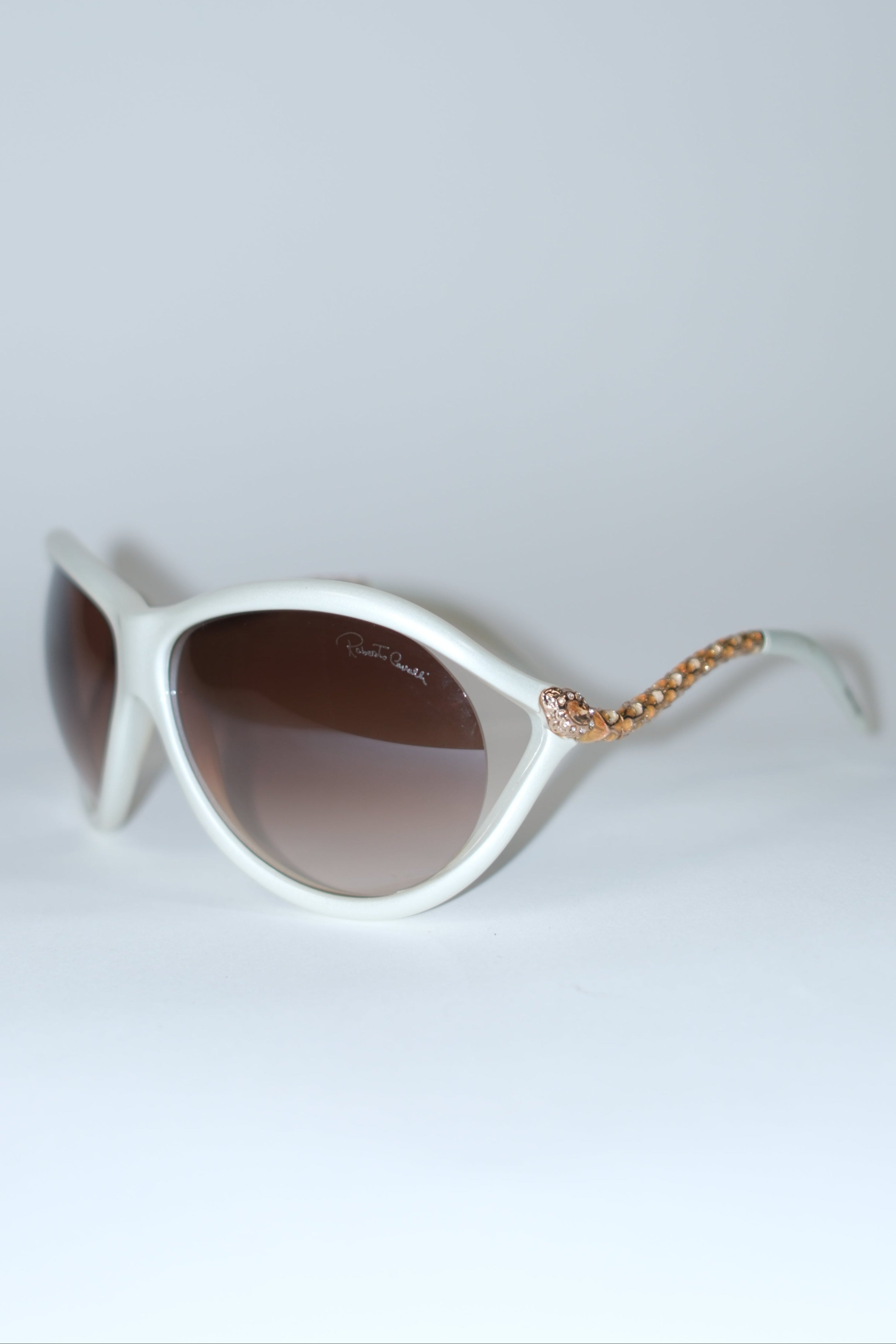 ROBERTO CAVALLI MILKY WHITE OVAL SUNGLASSES WITH BROWN LENSES AND SNAKE TEMPLES