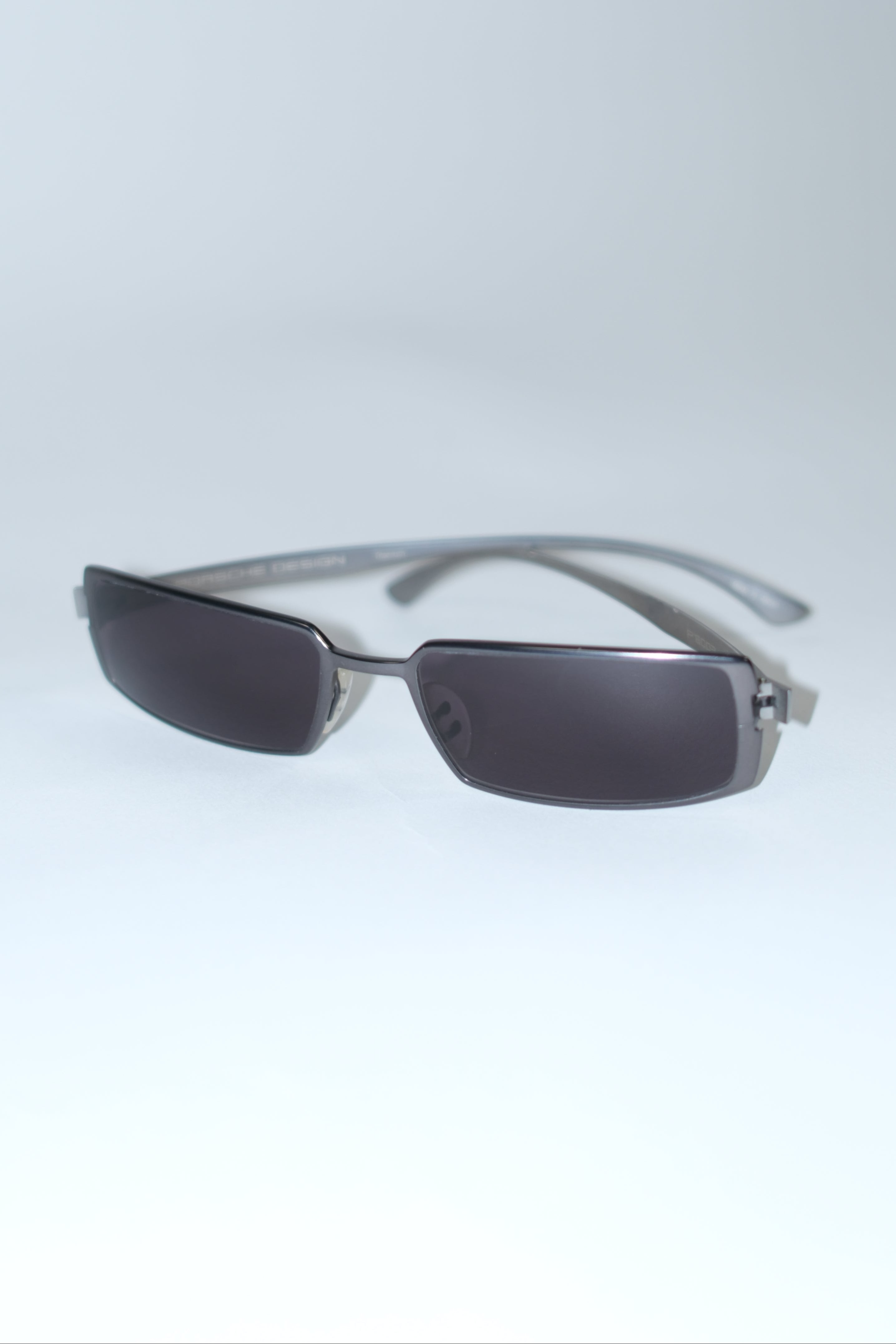 PORSCHE NARROW SUNGLASSES WITH MATTE SILVER FRAME AND GREY LENSES