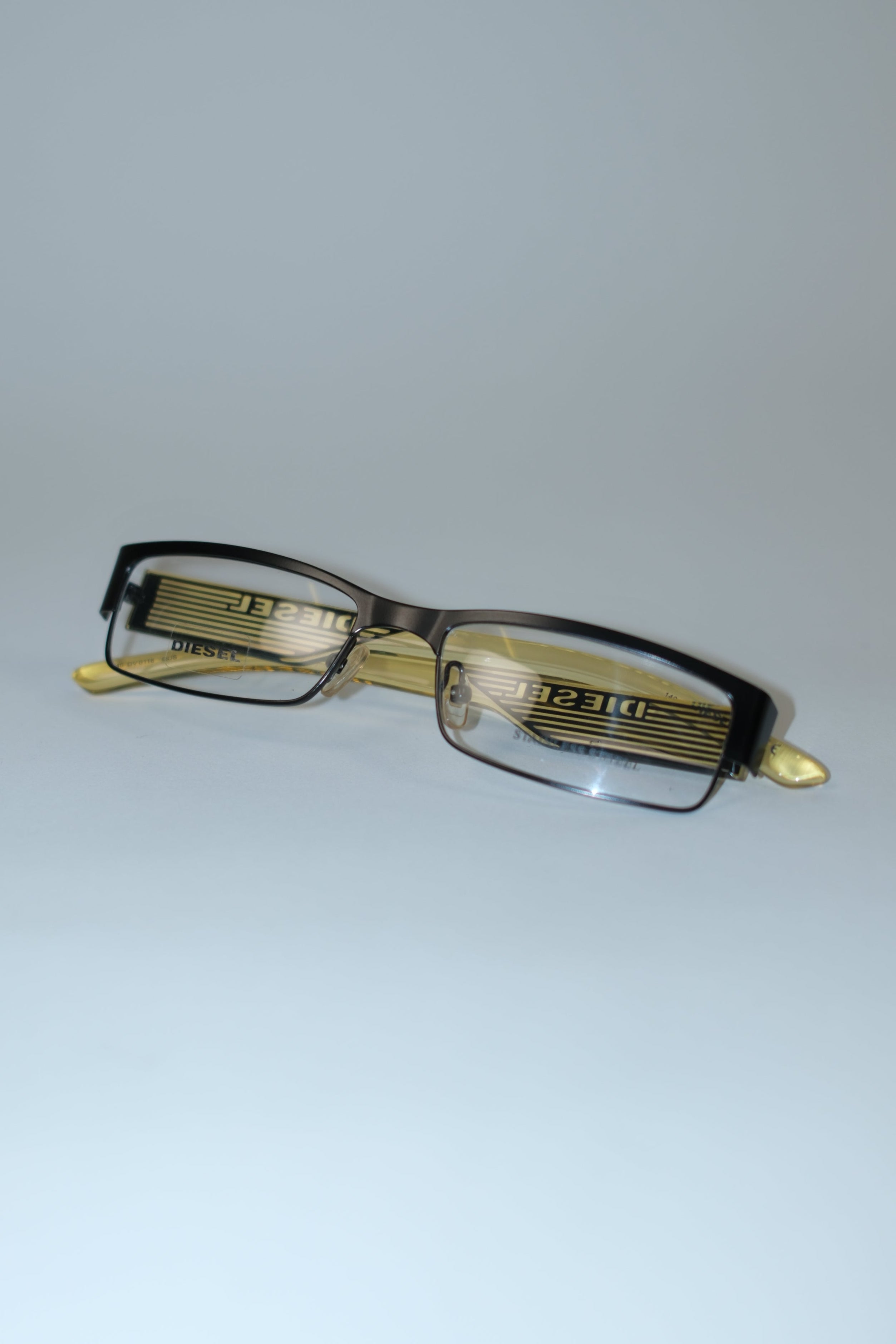 DIESEL YELLOW AND BLACK OPTICAL FRAMES WITH SIDE LOGO DETAILS