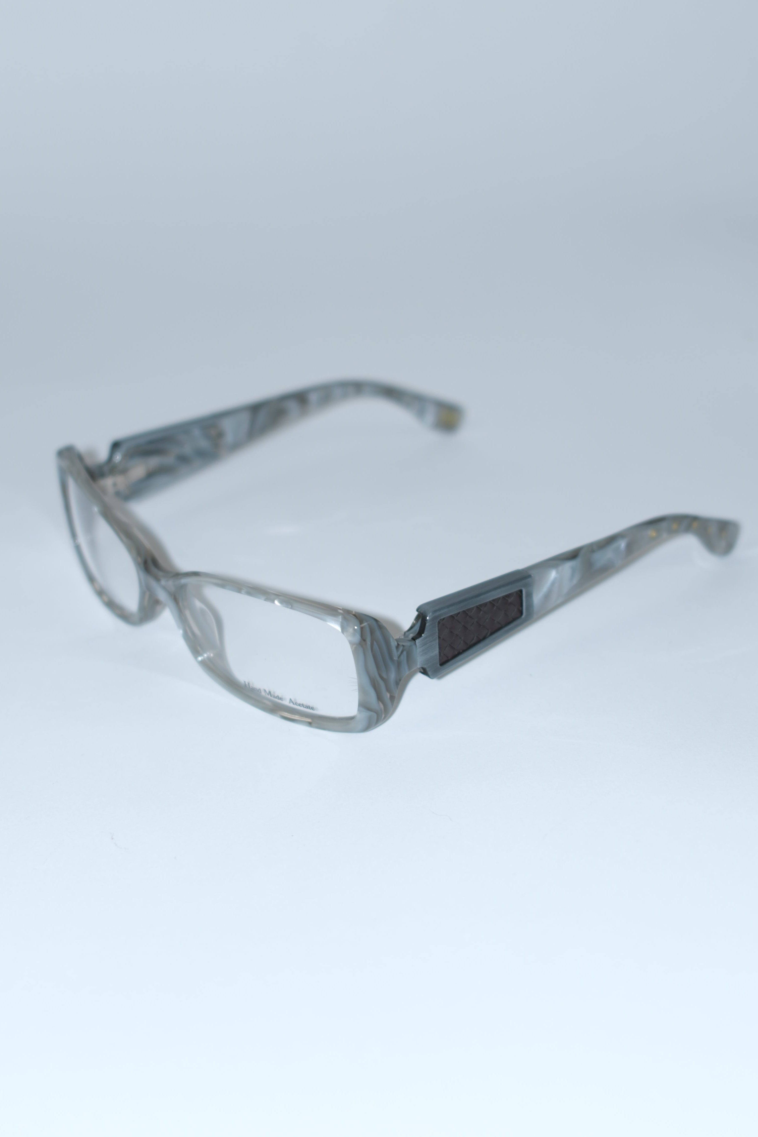 BOTTEGA VENETA PEARL EFFECT SILVER OPTICAL FRAMES WITH SIGNATURE INTRECCIATO TEMPLE DETAILS