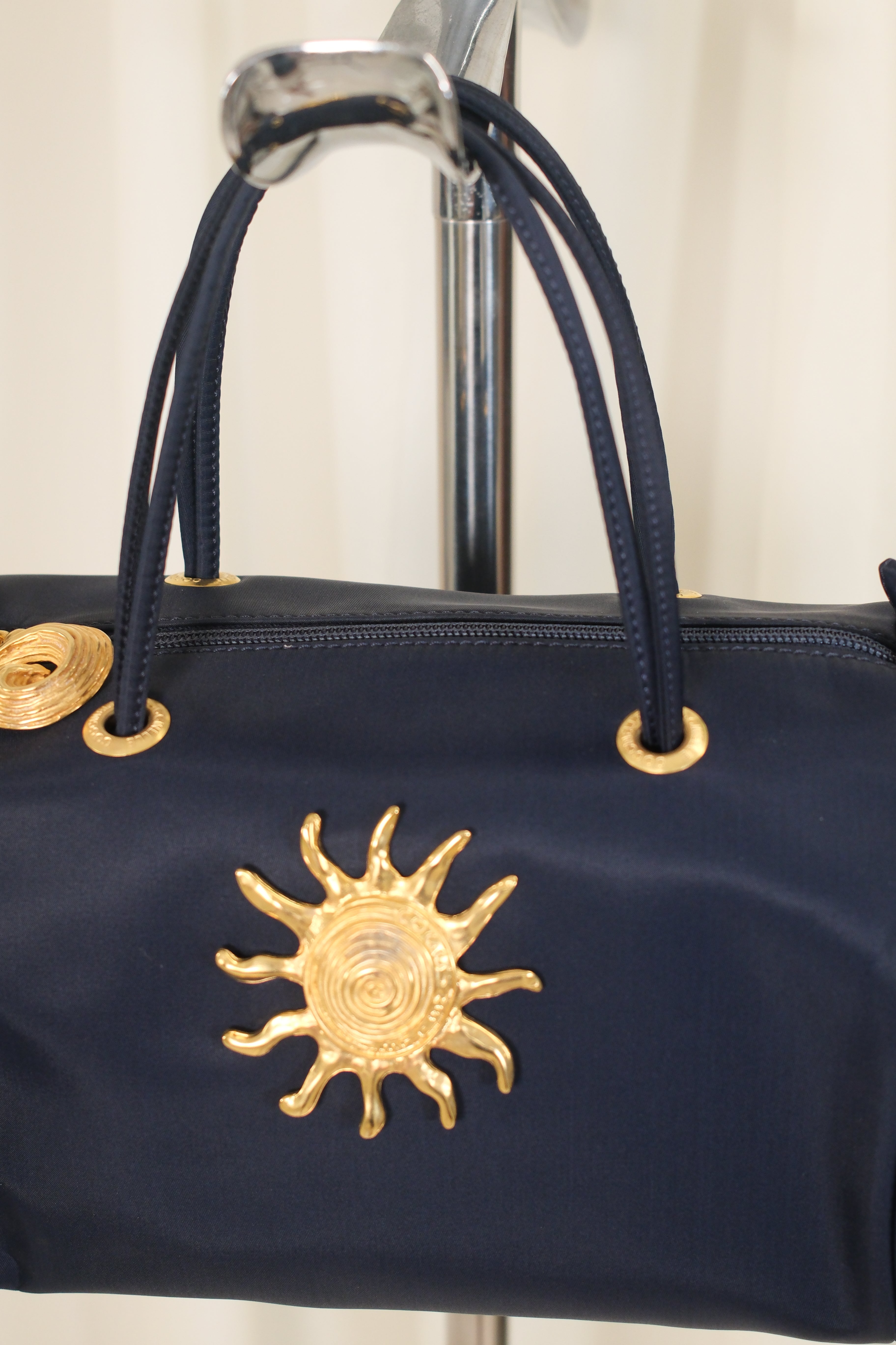 Coccinelle dark navy nylon Bag with Gold Metal Detailing