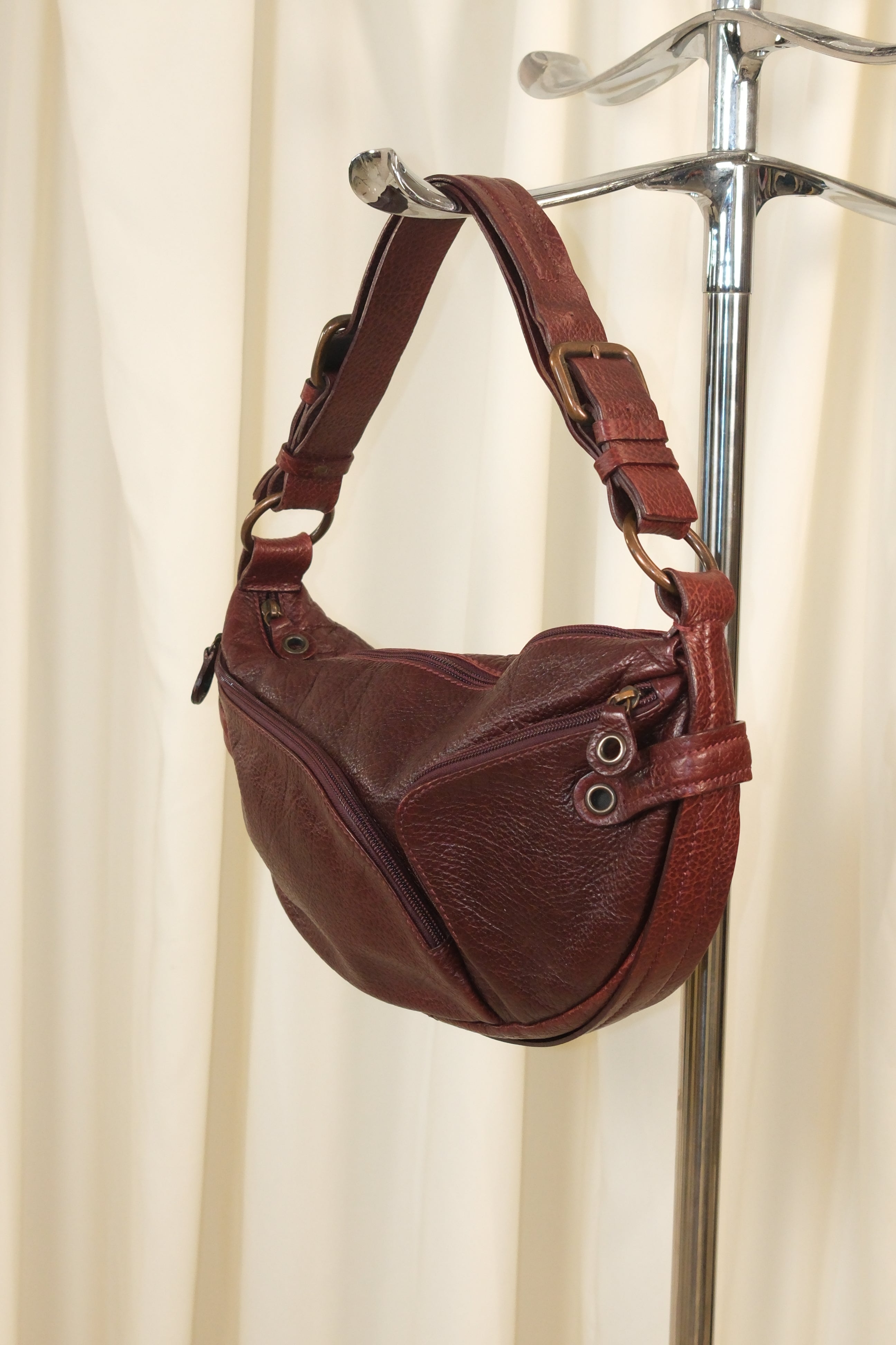 Francesco Biasia Asymmetrical Burgundy Bag with Multiple Pockets