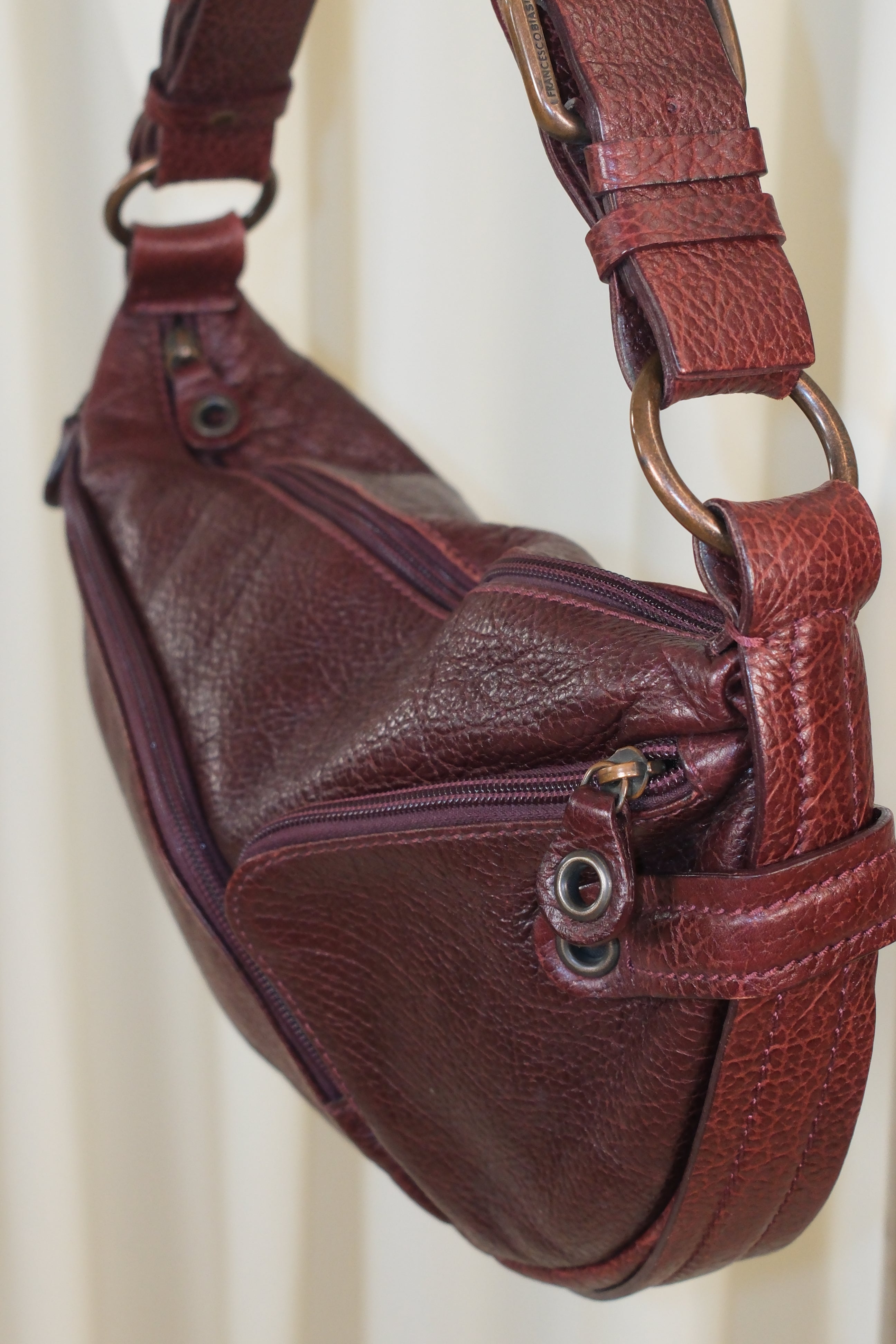 Francesco Biasia Asymmetrical Burgundy Bag with Multiple Pockets