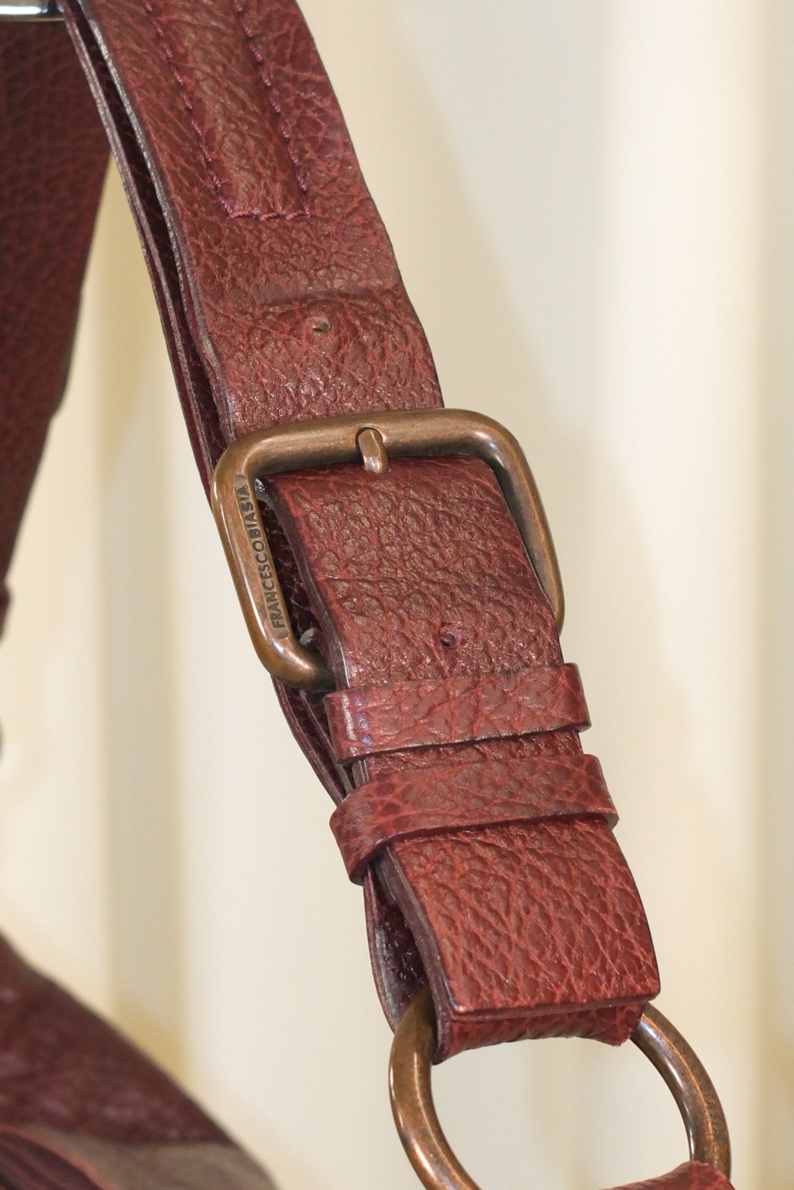 Francesco Biasia Asymmetrical Burgundy Bag with Multiple Pockets