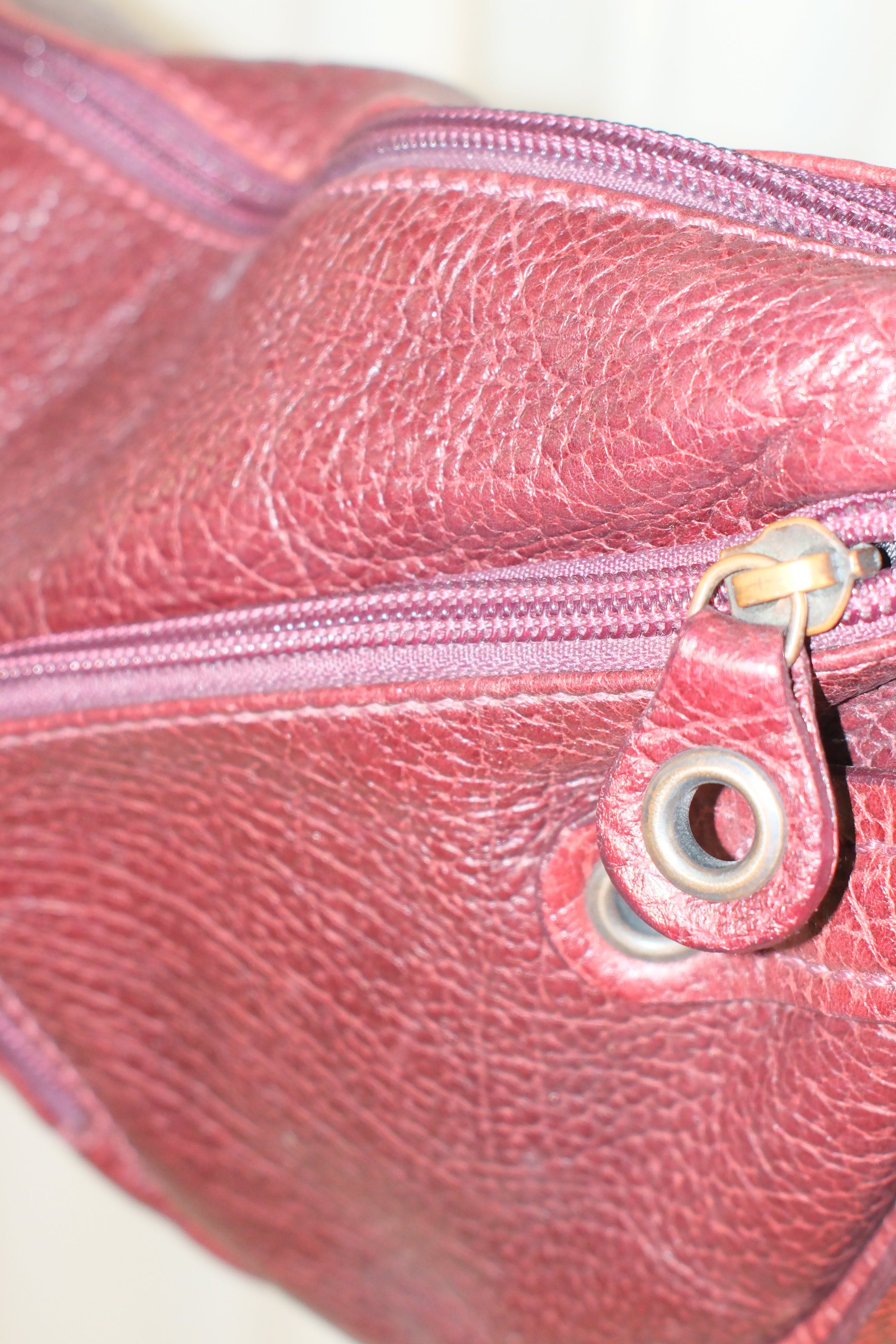 Francesco Biasia Asymmetrical Burgundy Bag with Multiple Pockets