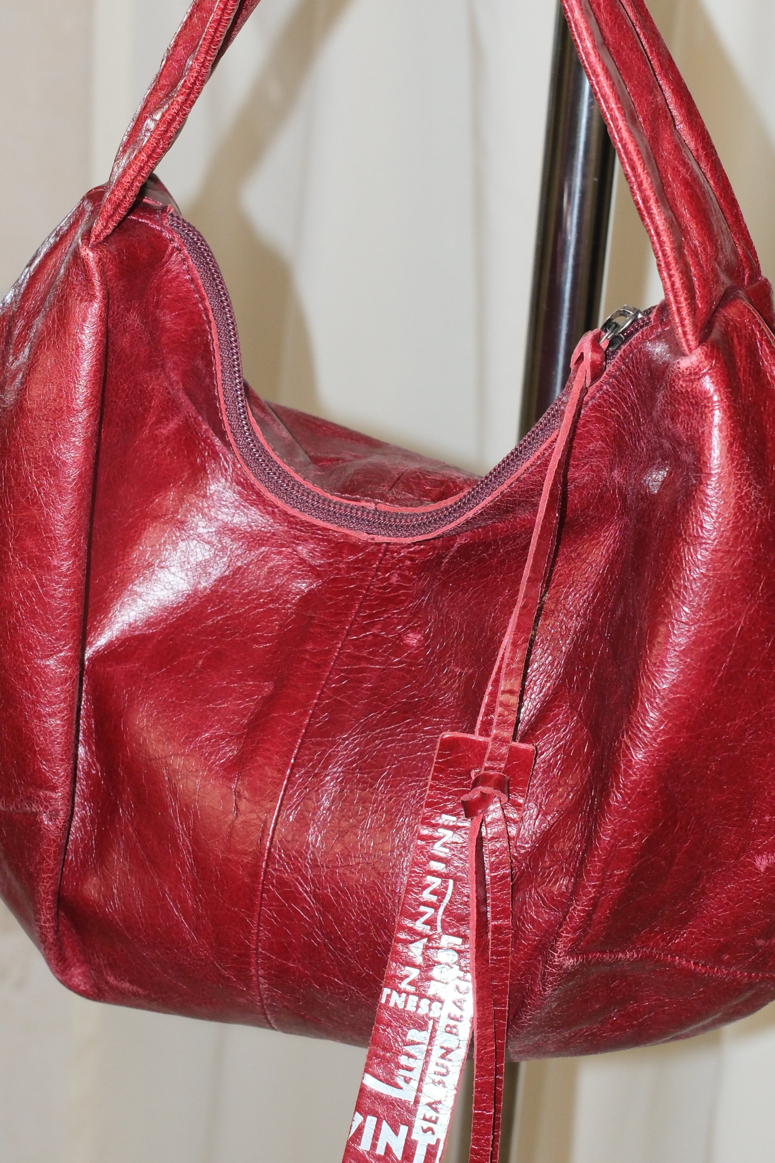 Nannini Wine Red Handbag with Leather Charm