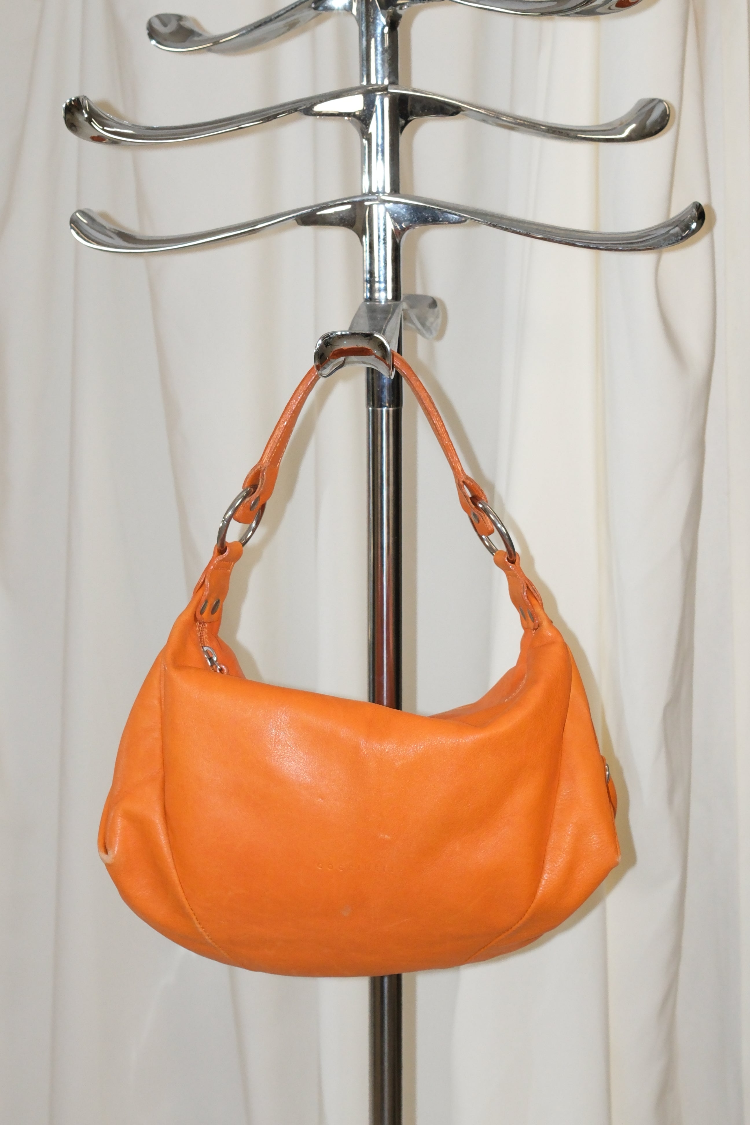 COCCINELLE PUFFY SHOULDER BAG IN ORANGE LEATHER